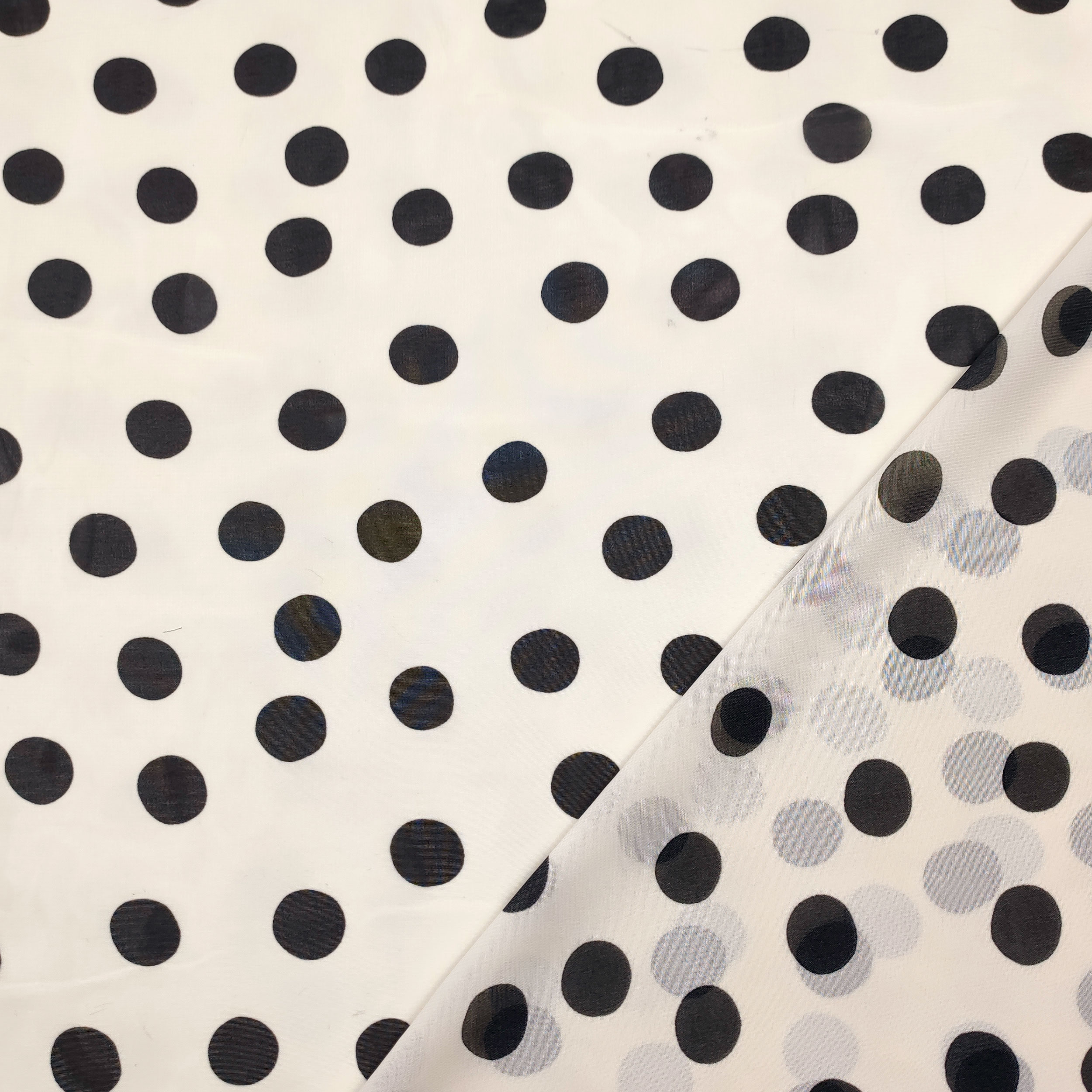Tissu Georgette crème à pois noirs
