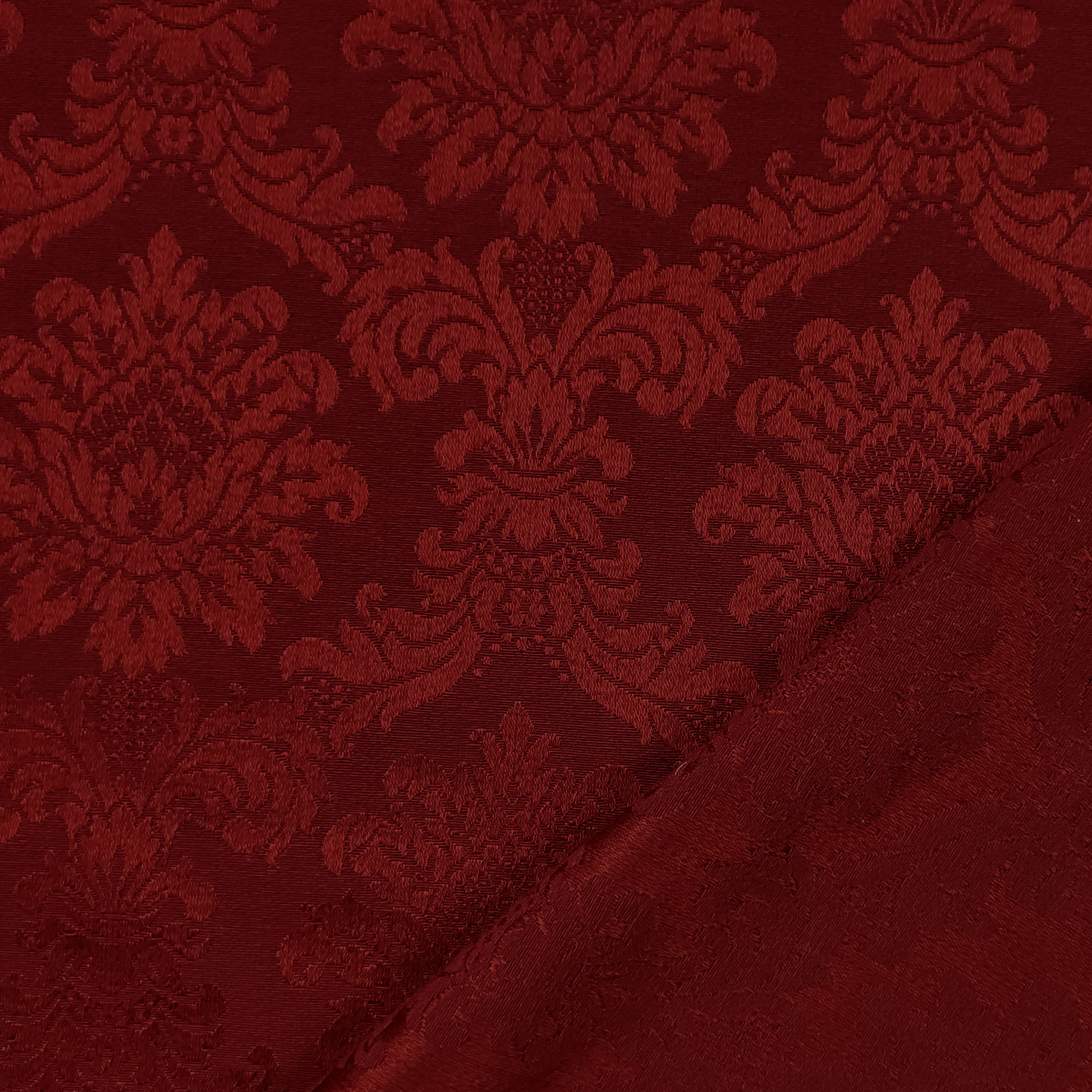 Tissu damassé rouge foncé
