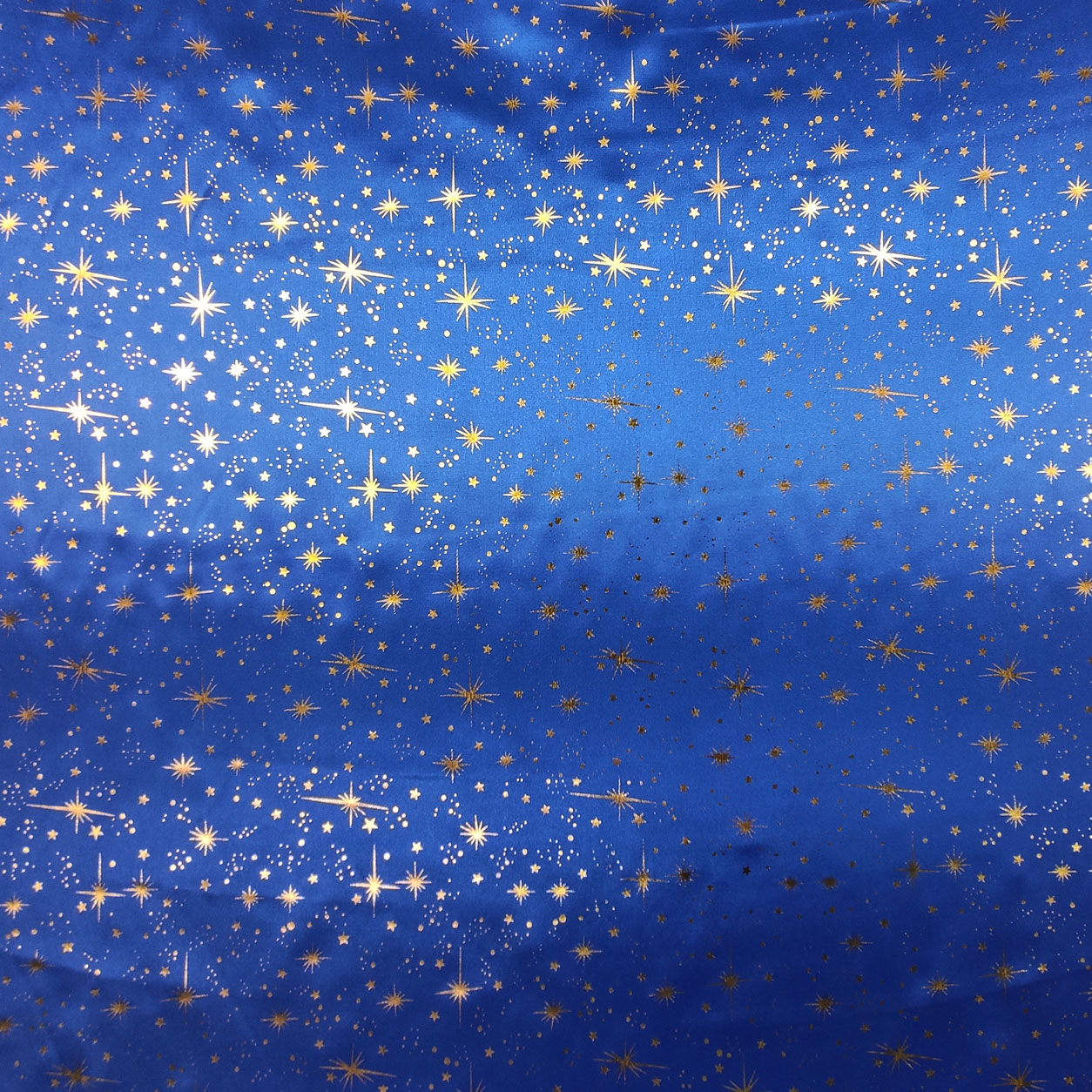 tessuto-raso-stampato-stelle-oro