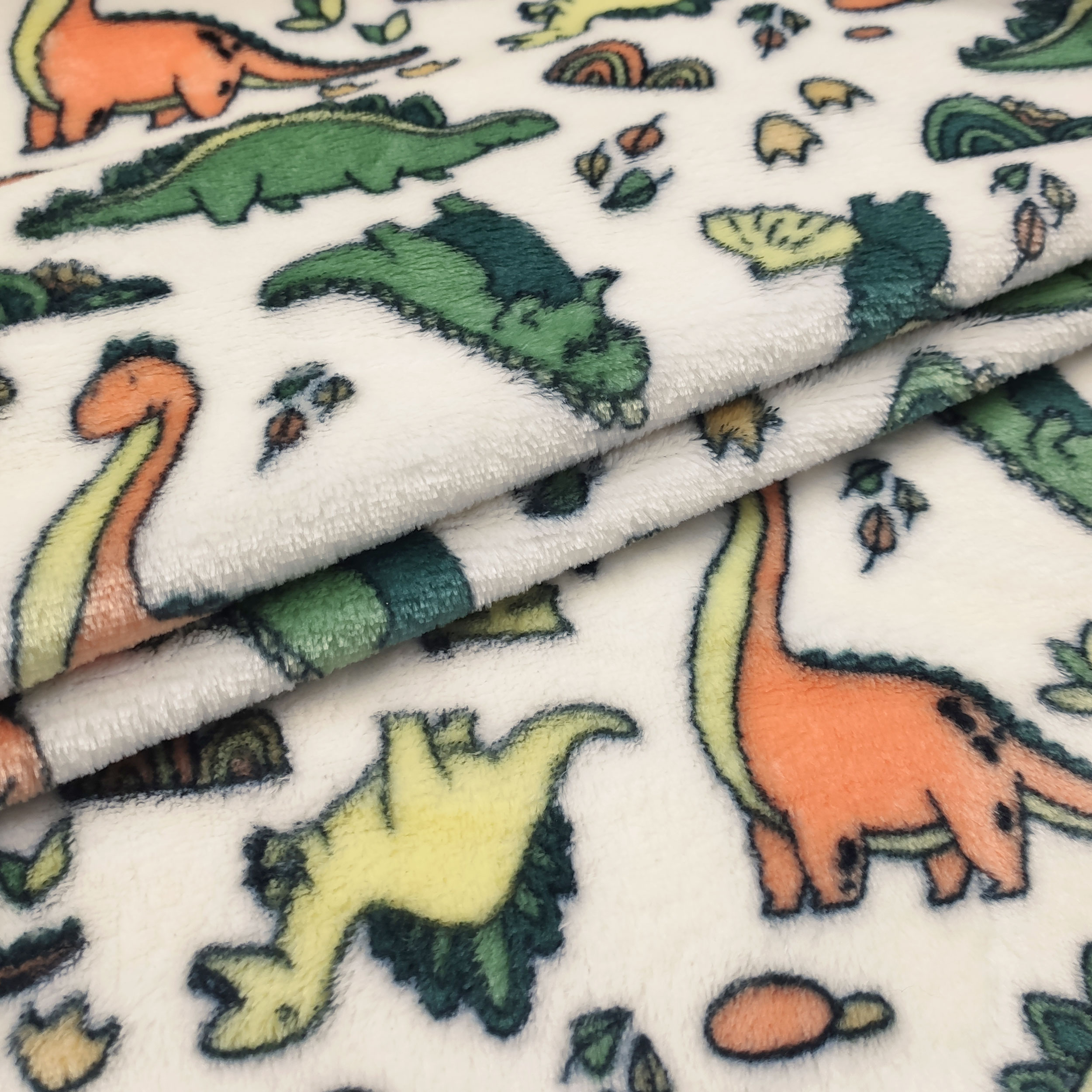 Pila Mano Cachemira Dinosaurios Crema Fondo