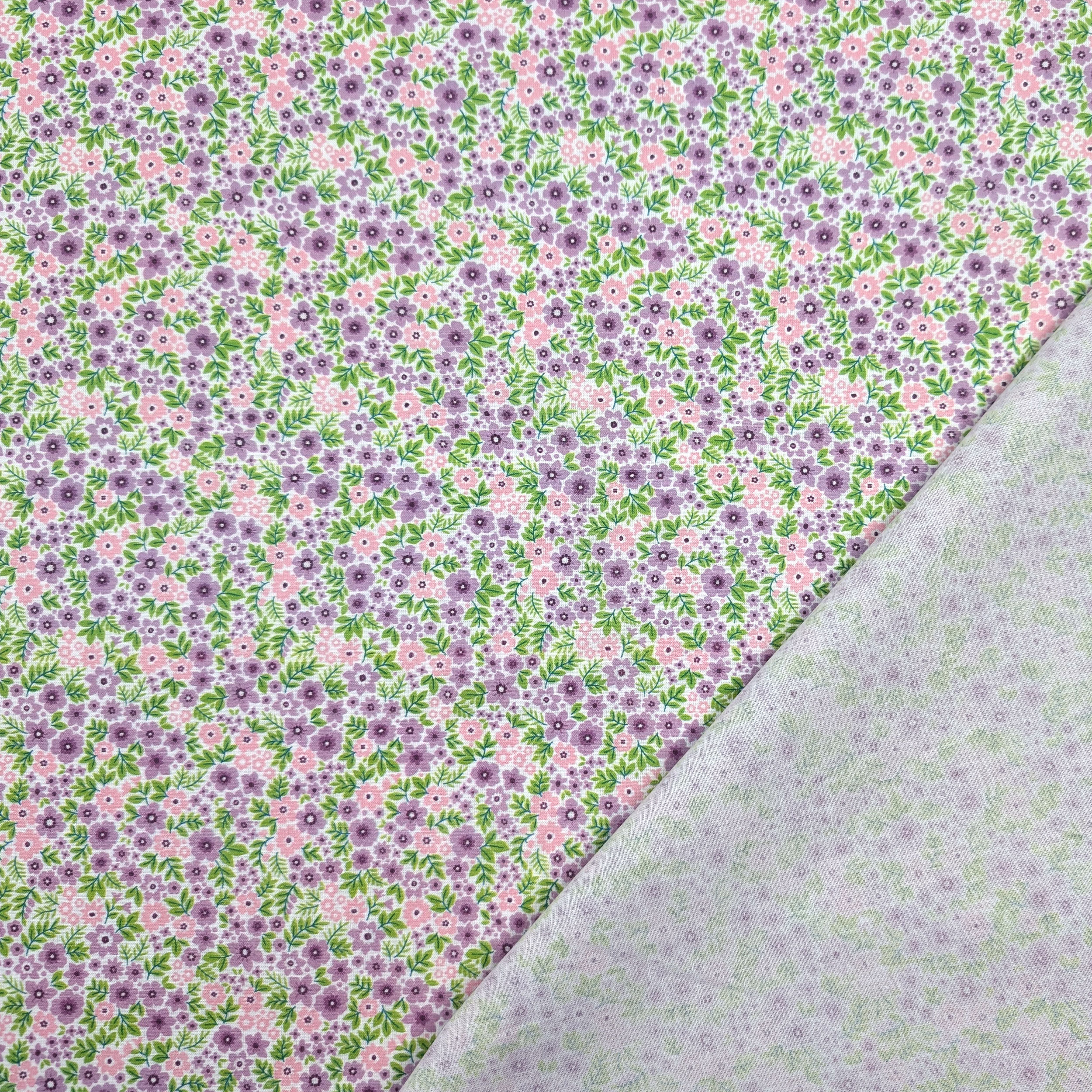 Percale cotton with pink and lilac flowers Image