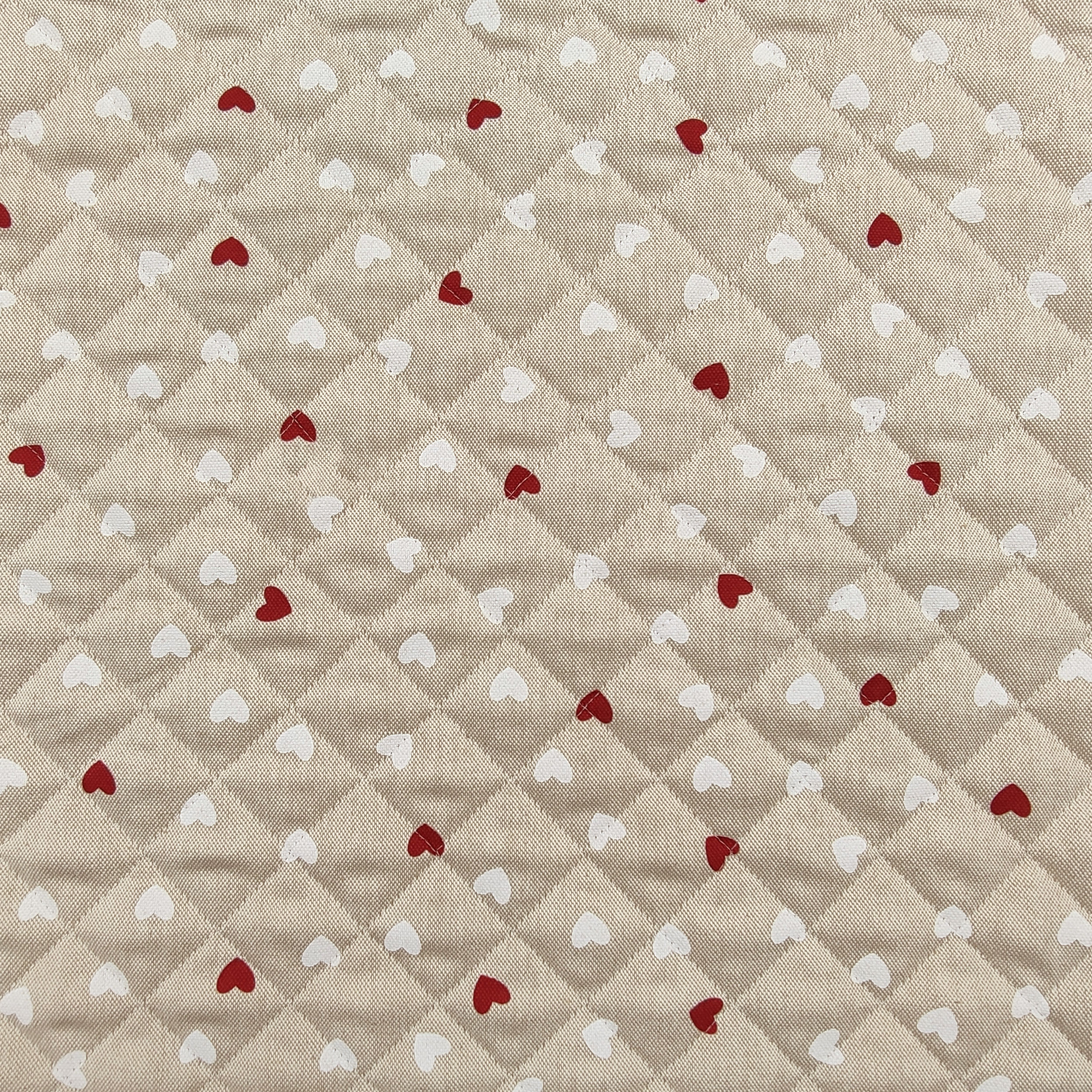 Red and White Heart Quilted Fabric Image