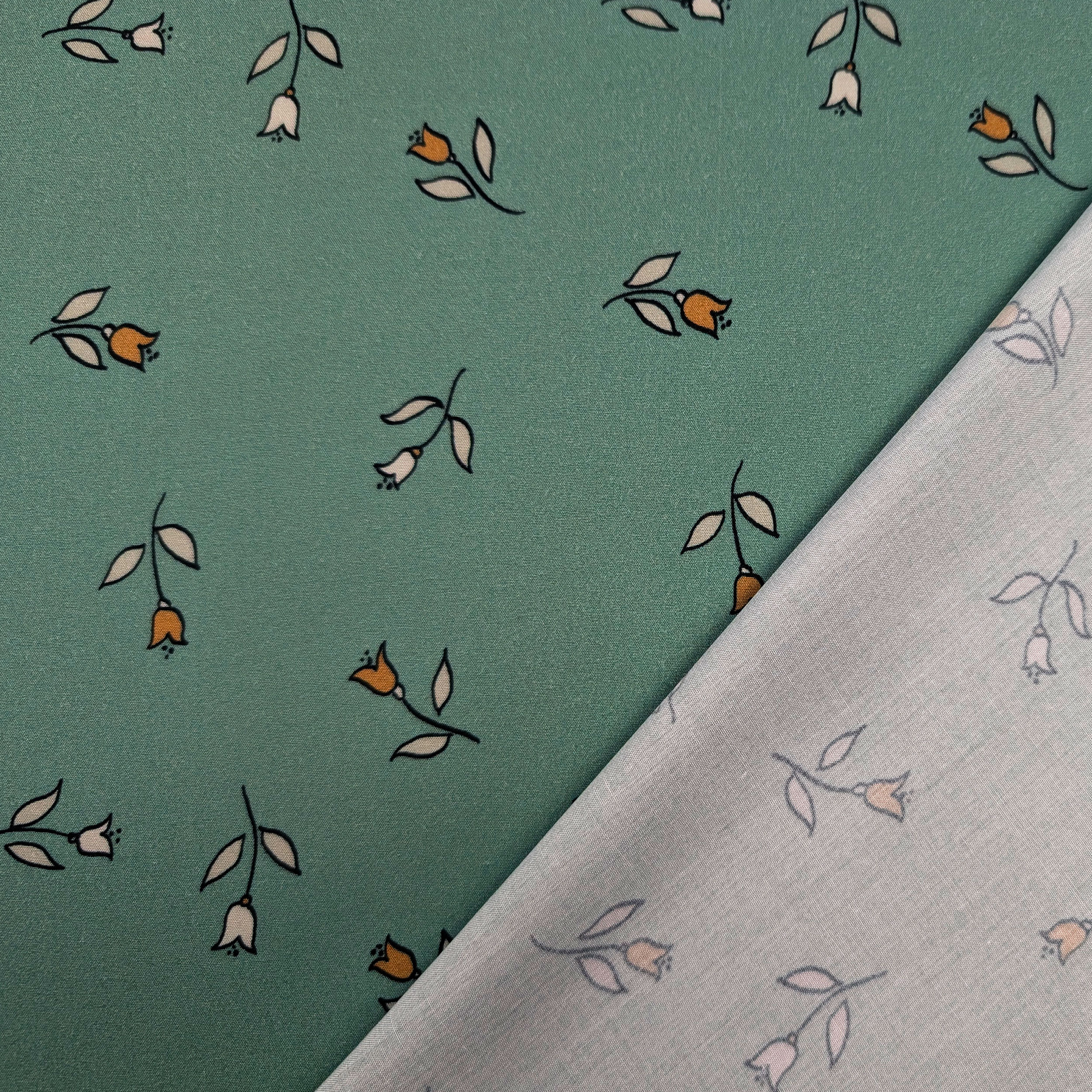 Viscose with Floral Pattern on a Green Background Image