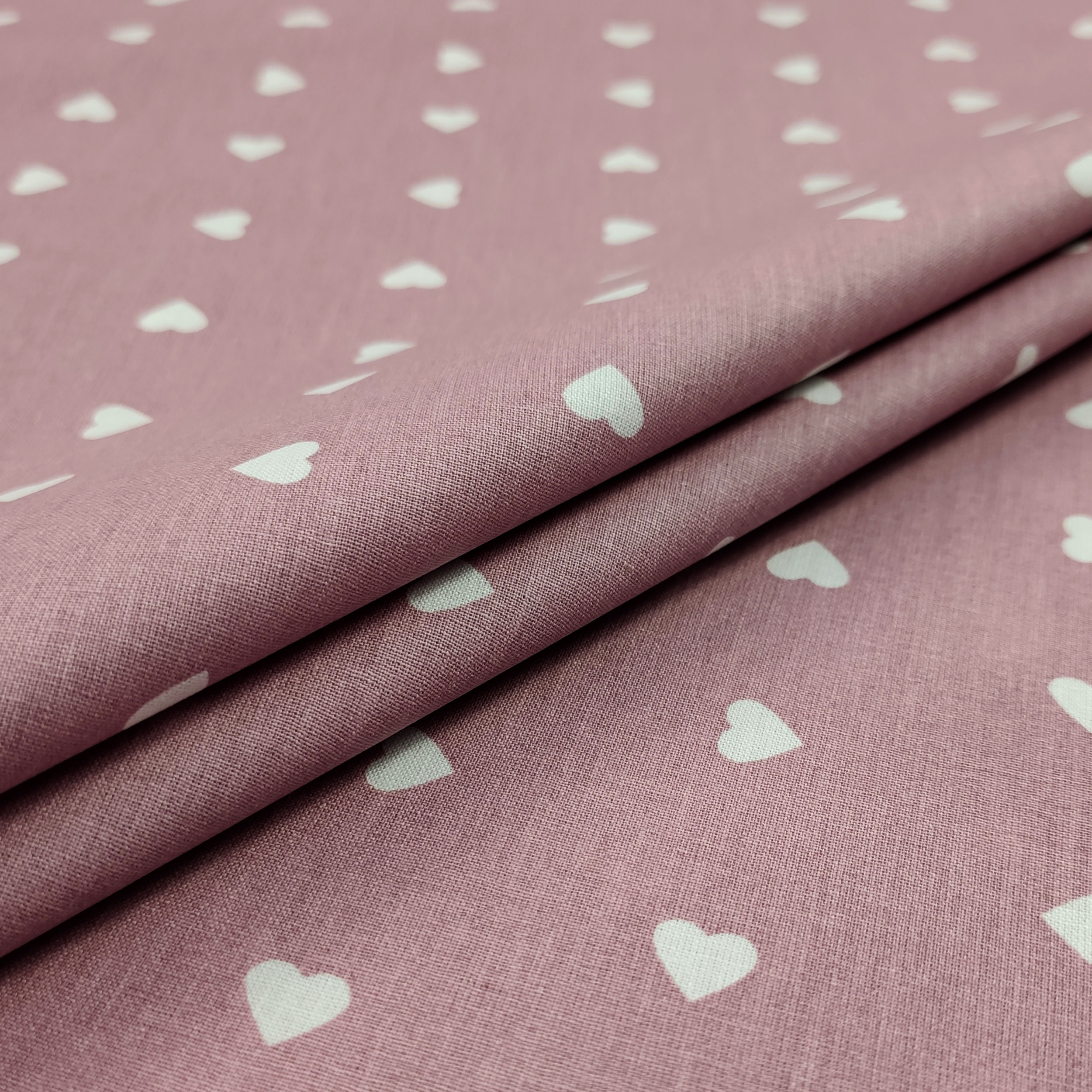 Printed Cotton with White Hearts - Colored Background  Image
