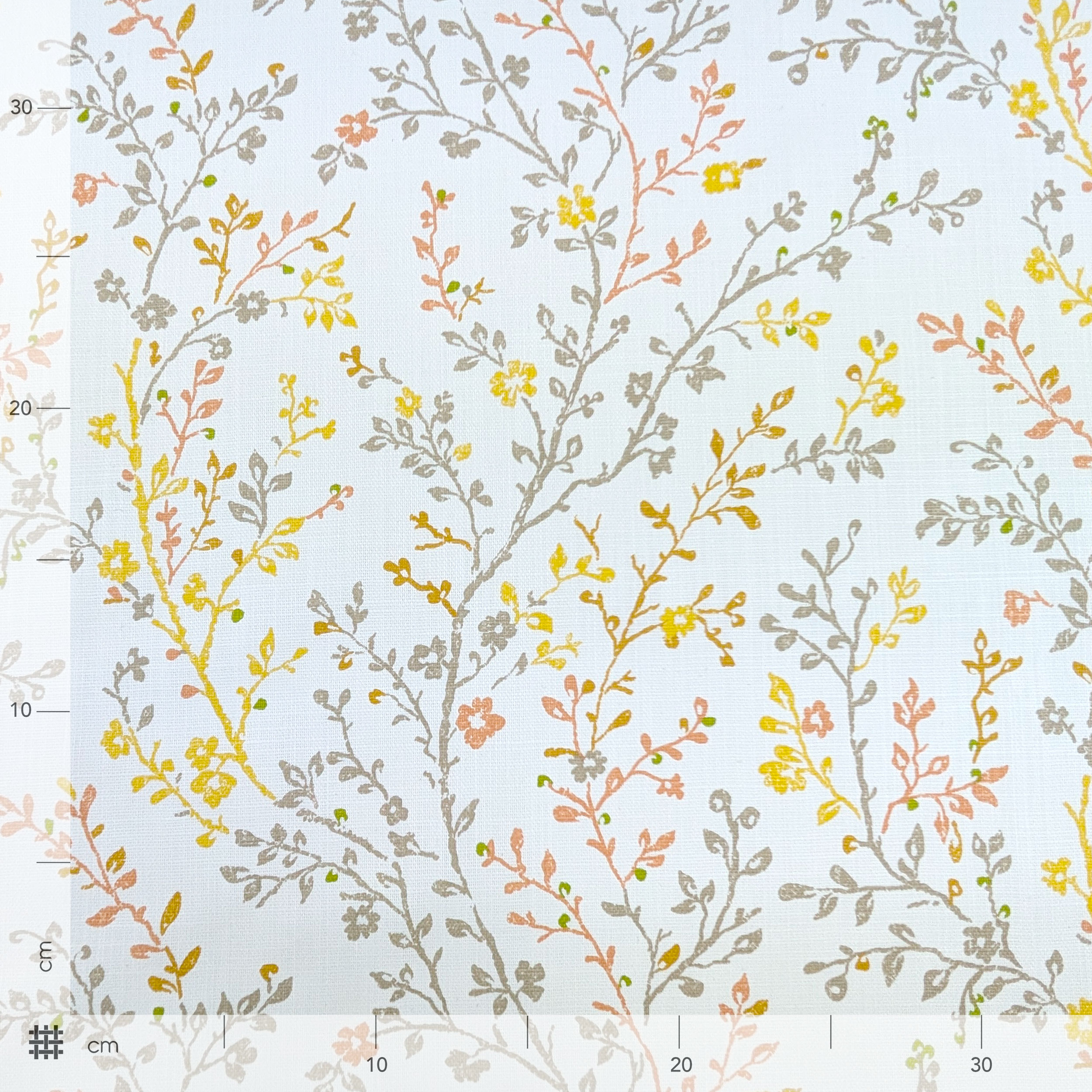 Lin de coton meublant les branches avec des fleurs aux tons chauds Image