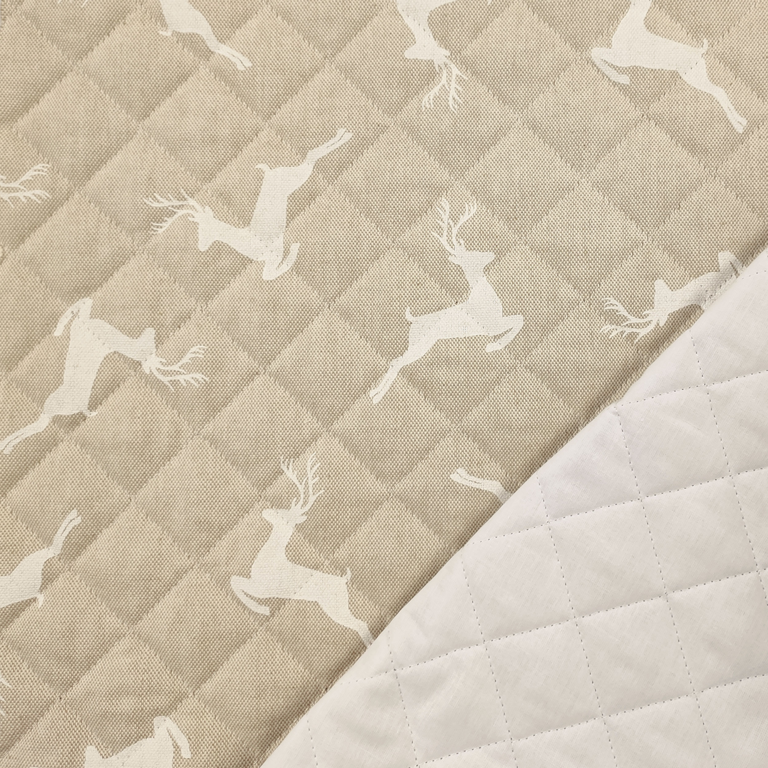 Tissu matelassé Renne Fond Beige