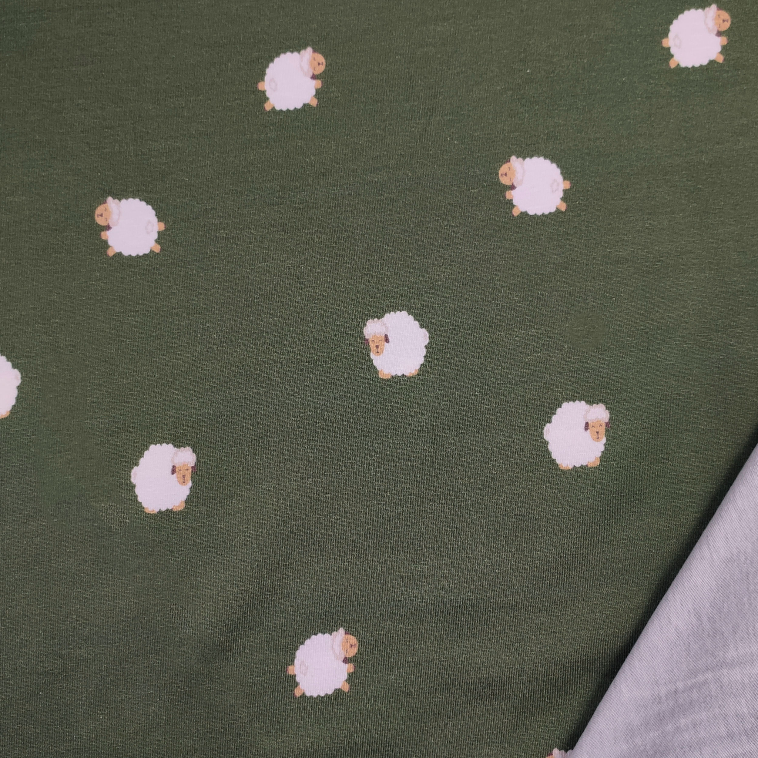 Jersey coton motif mouton fond militaire