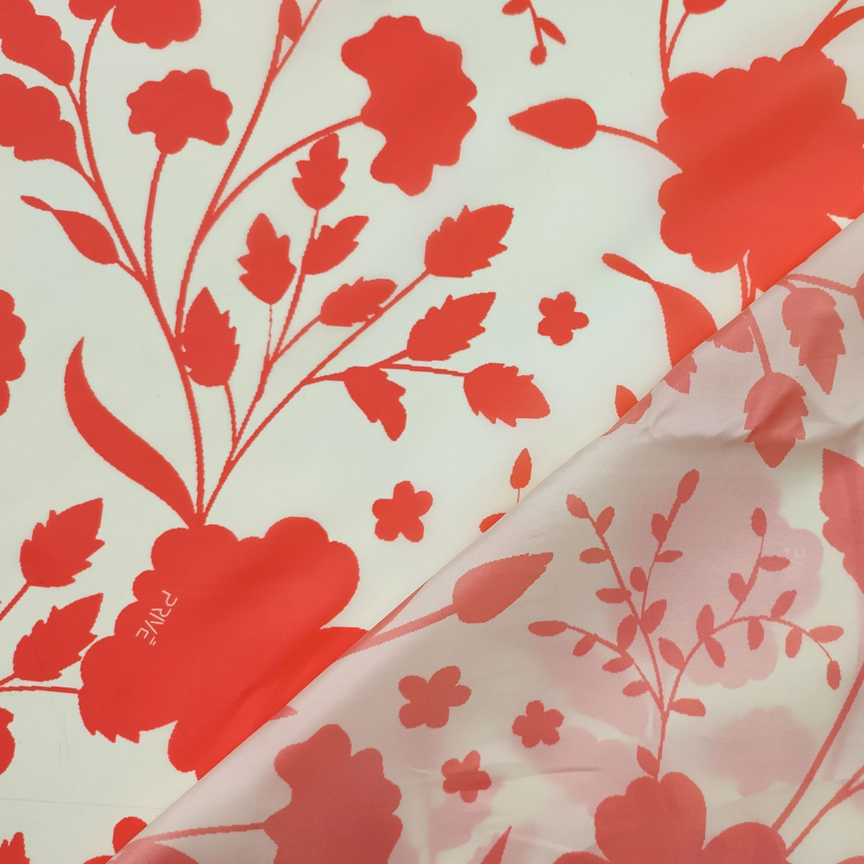 Tessuto Impermeabile Fantasia di Fiori Arancio