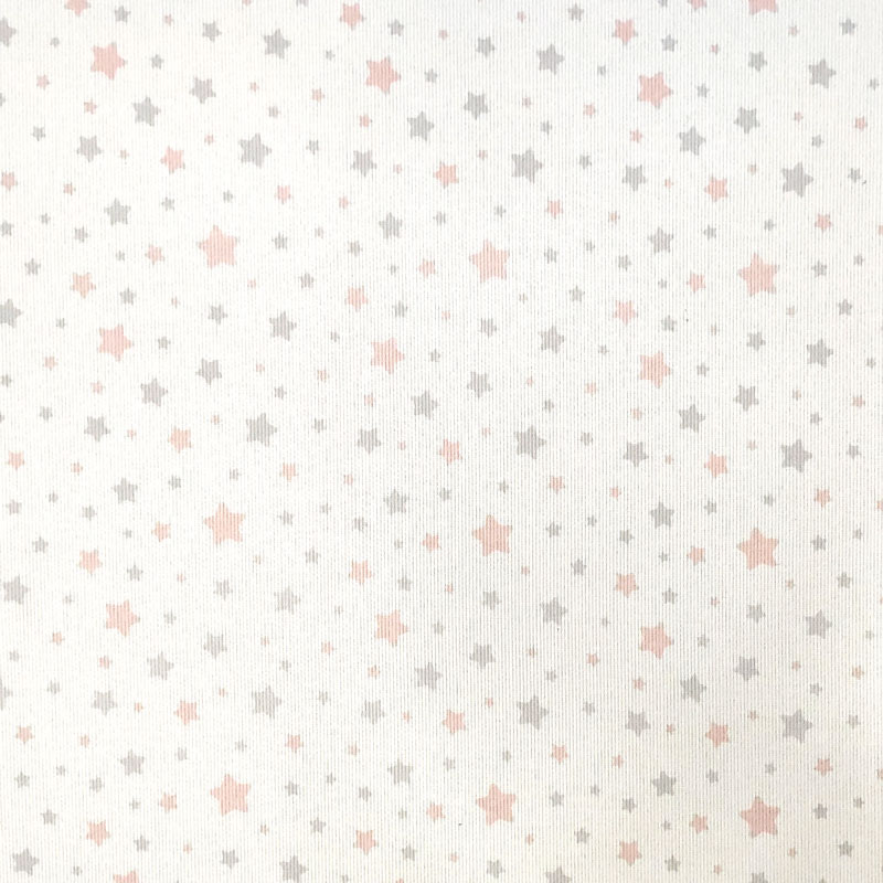 Tela de piqué de algodón con estampado de estrellas rosas
