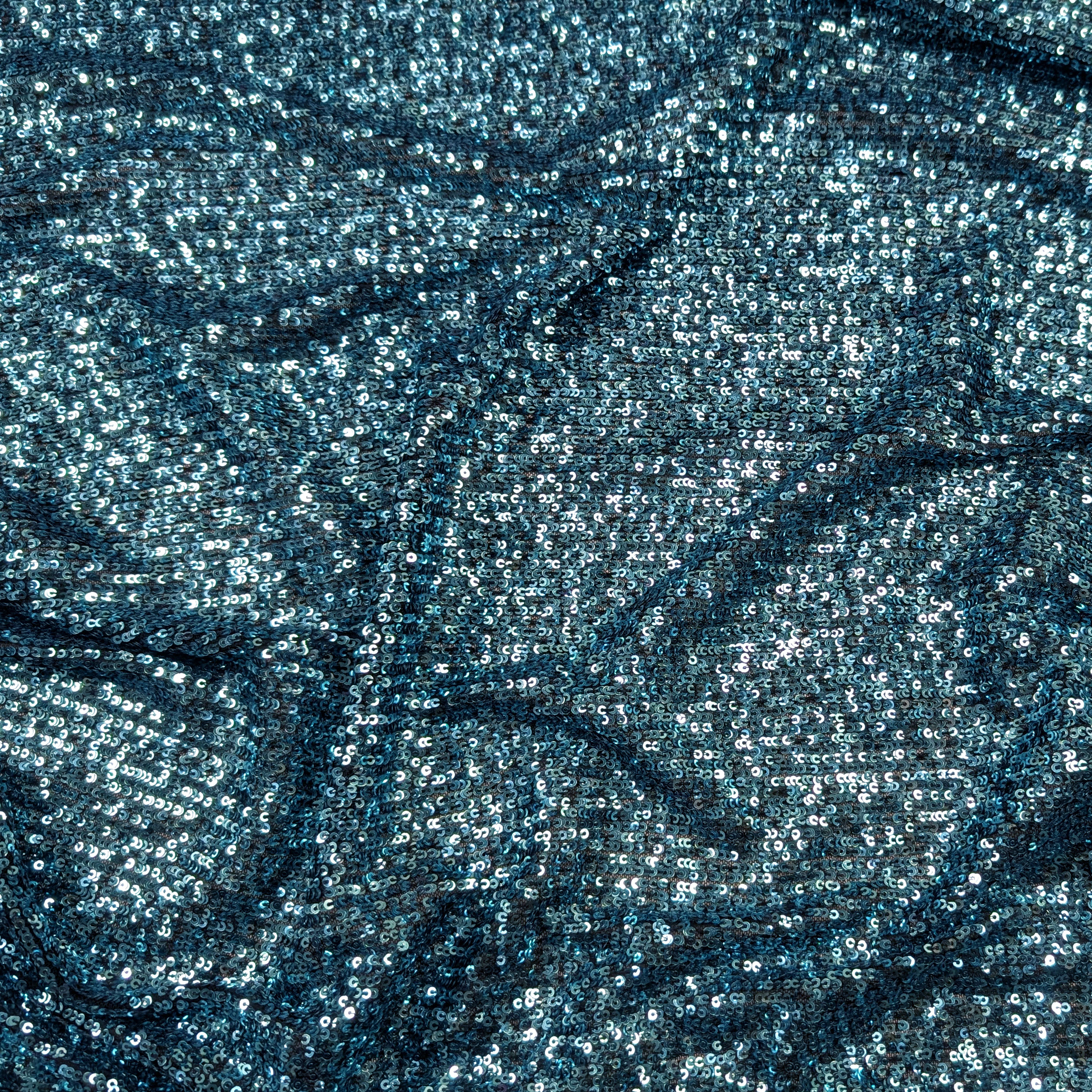 Sequins on Turquoise Stretch Tulle Image