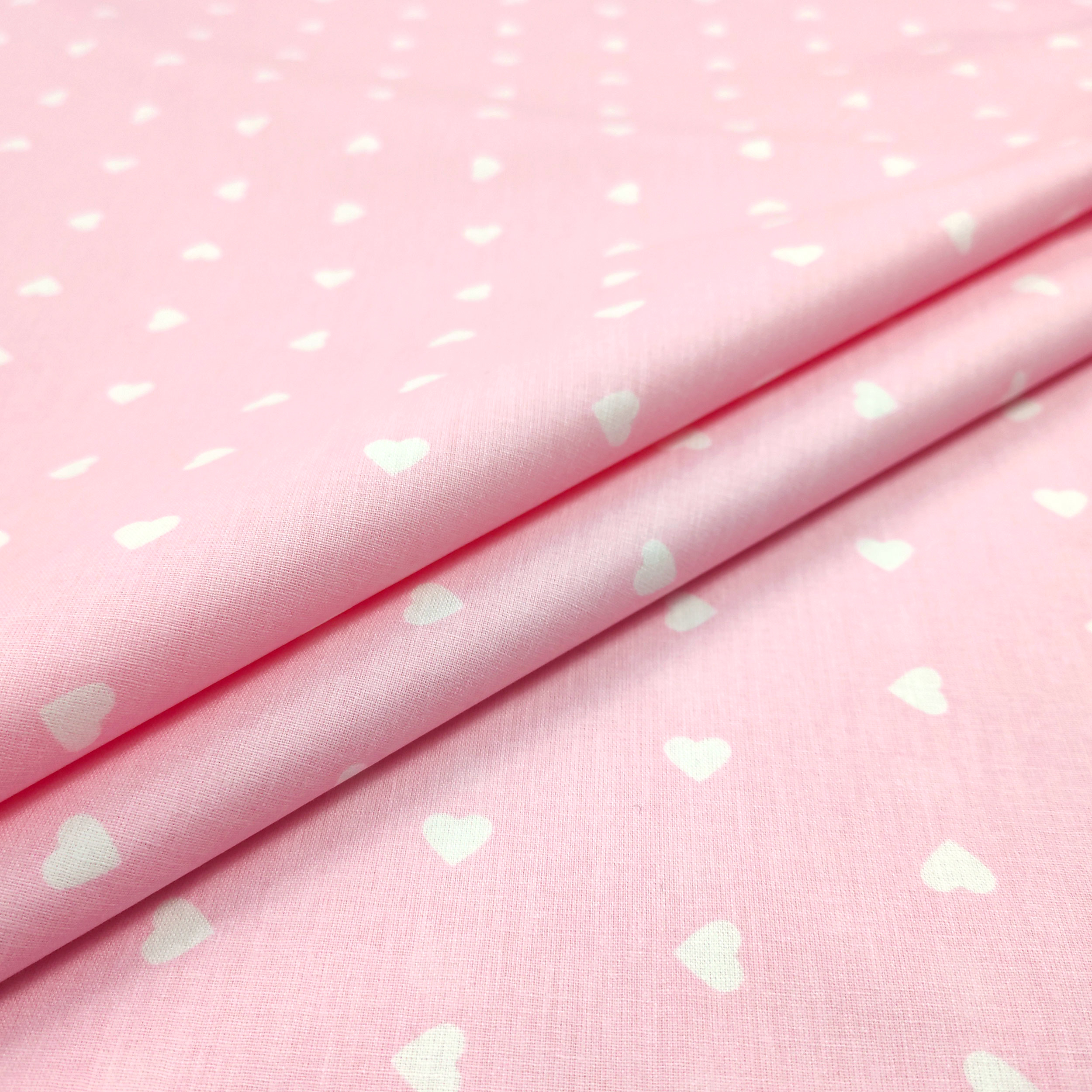 Printed Cotton with White Hearts - Colored Background  Image