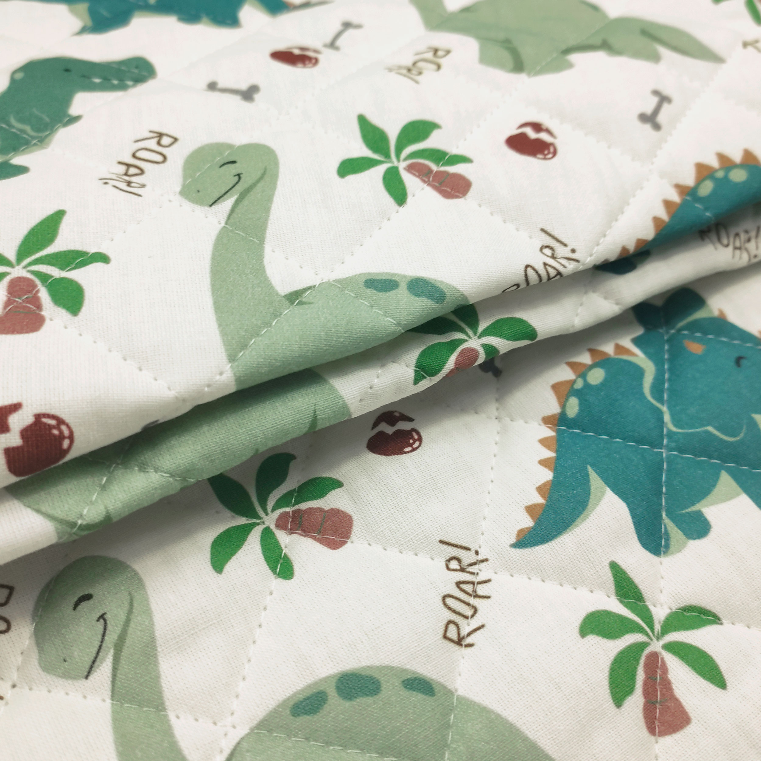 Dinosaurs Quilted Fabric Image