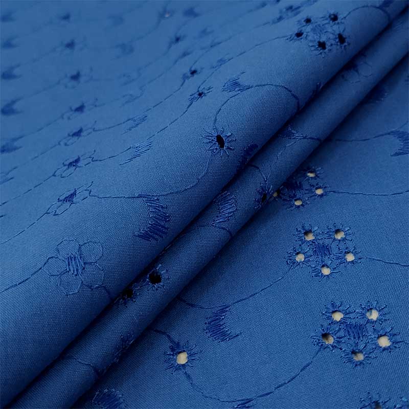 Tessuto Sangallo Tinta Unita Fantasia Sole Luna Fiori 