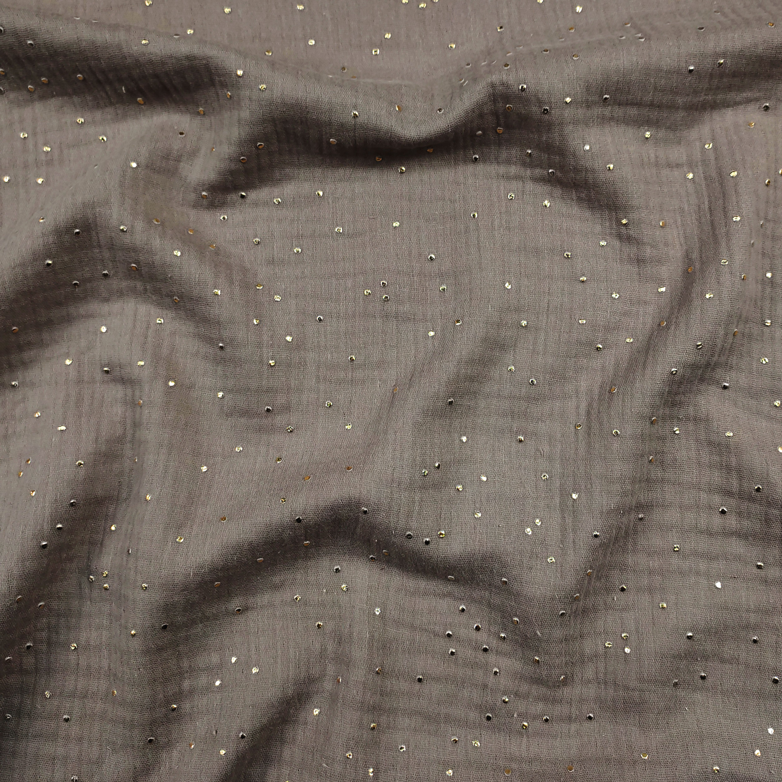 Beigefarbener Baumwollmusselin mit goldenen Polka Dots