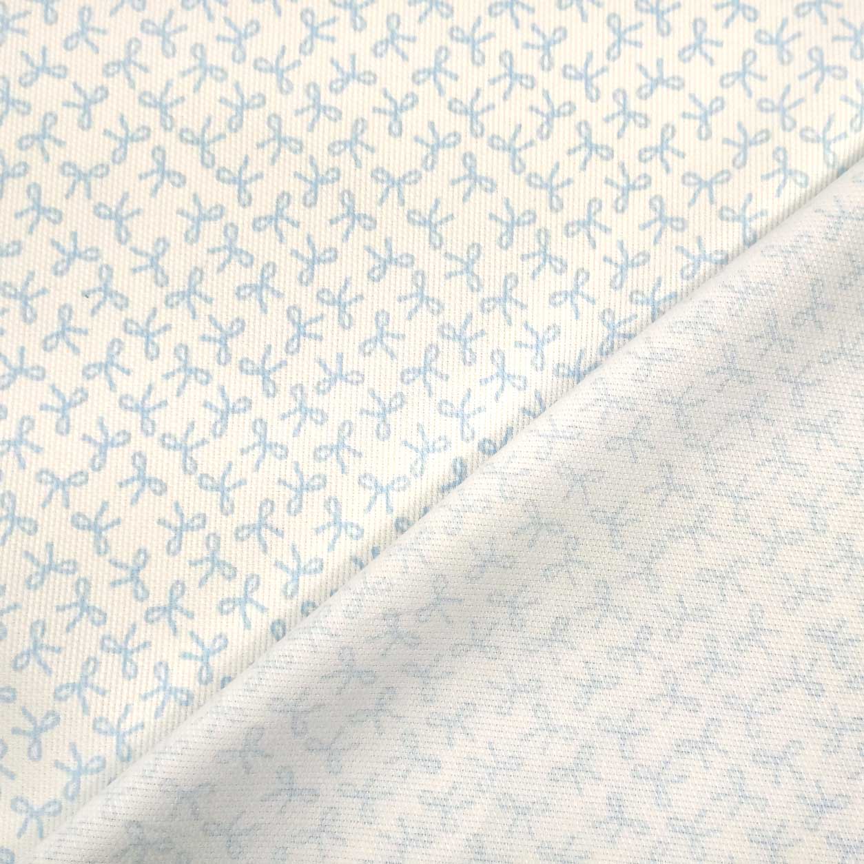 tessuto-cotone-piquet-con-fiocchi-azzurro