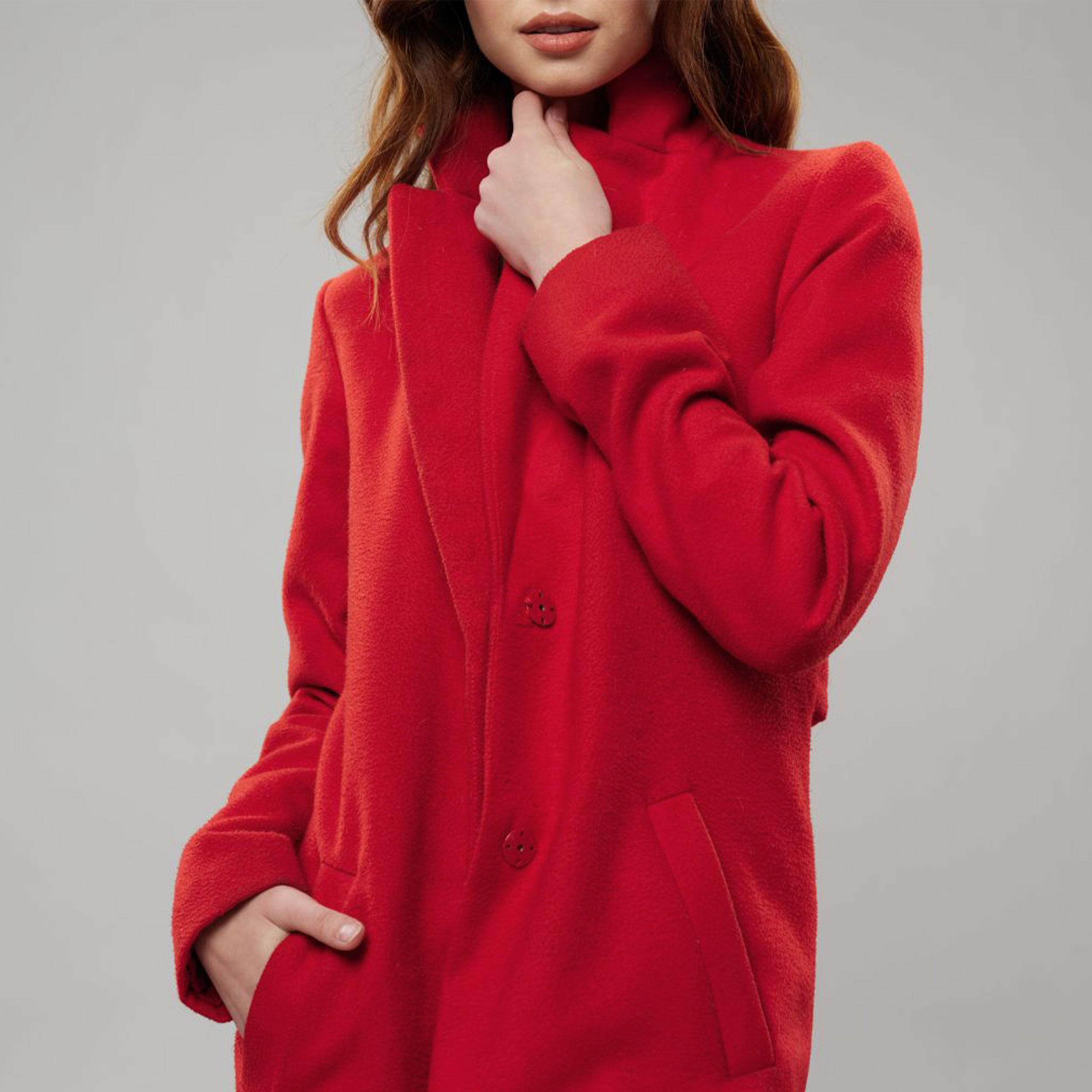 Manteau d'hiver rouge extensible de couleur unie Image
