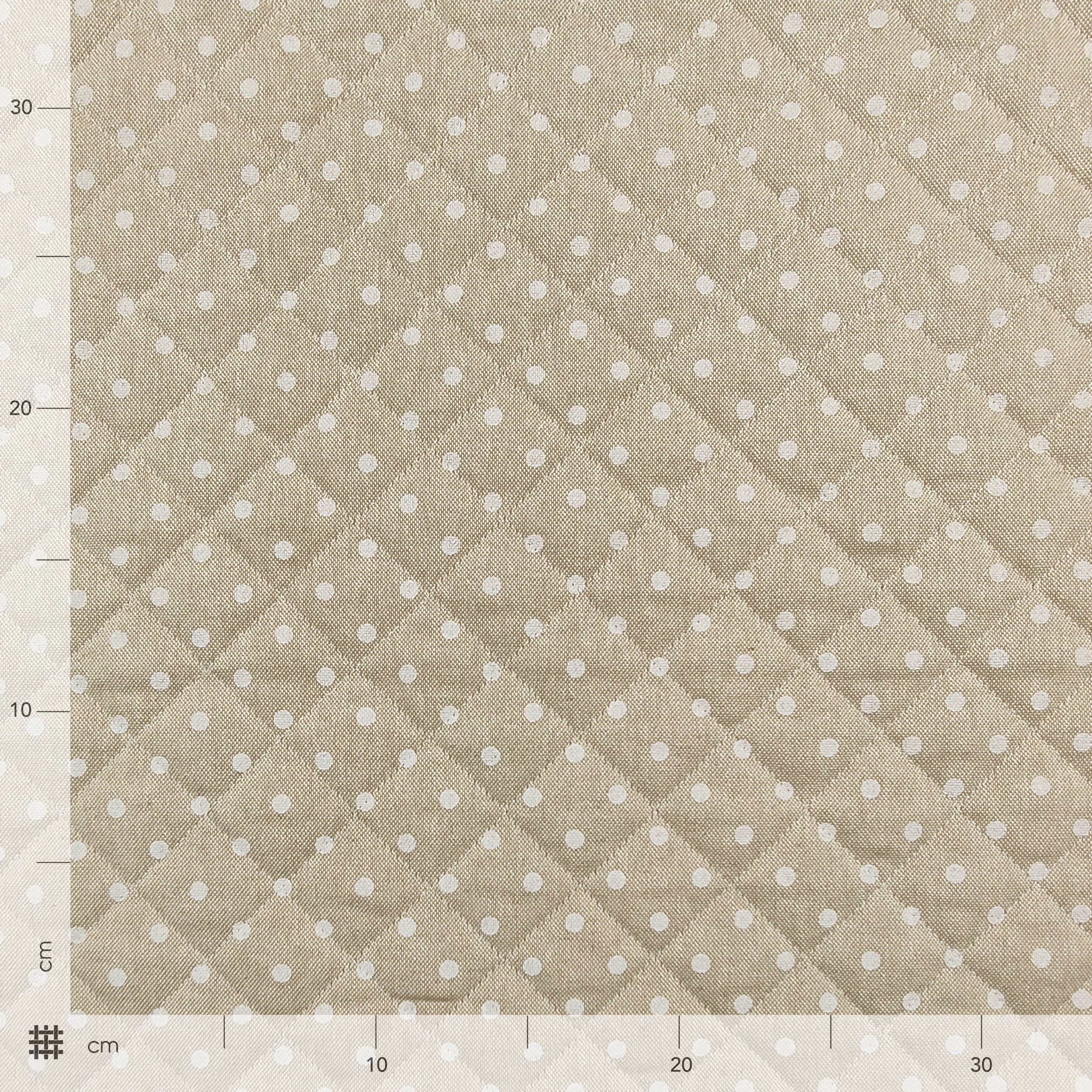 White Polka Dot Quilted Fabric