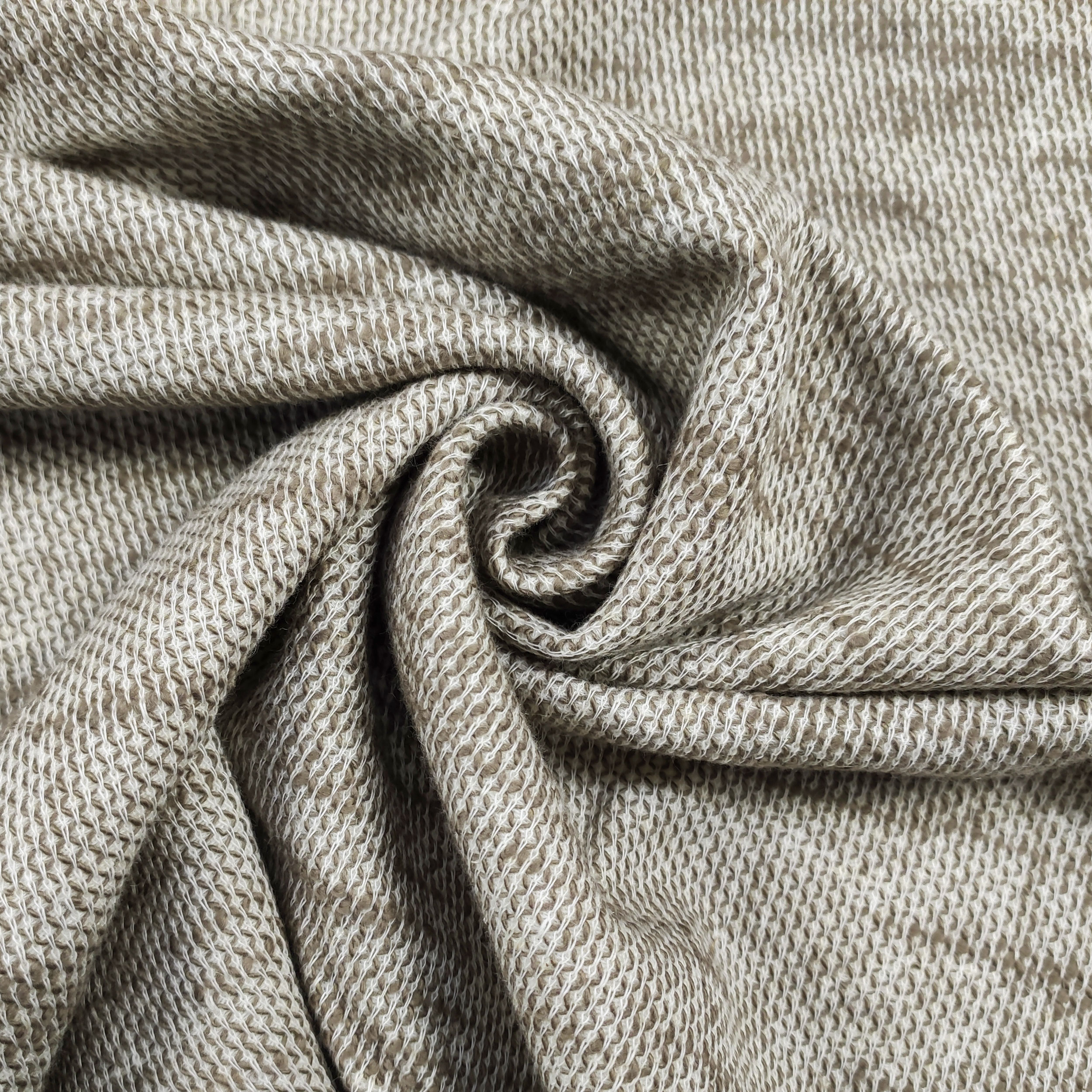 Tissu en maille beige mélangé