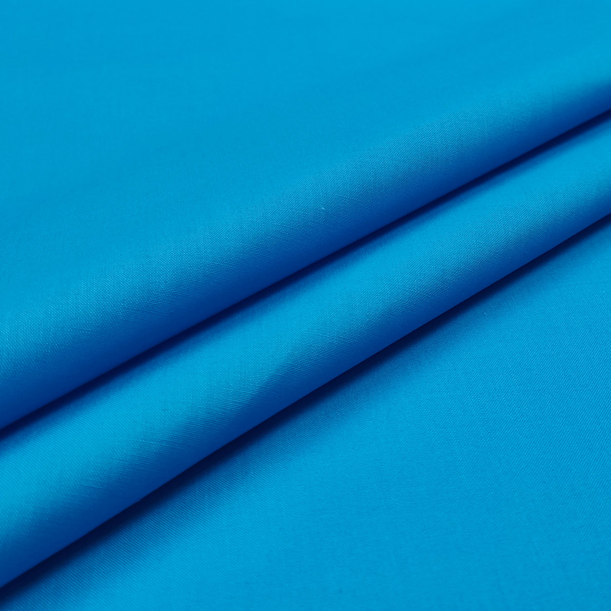 tessuto-misto-cotone-abbigliamento-turchese