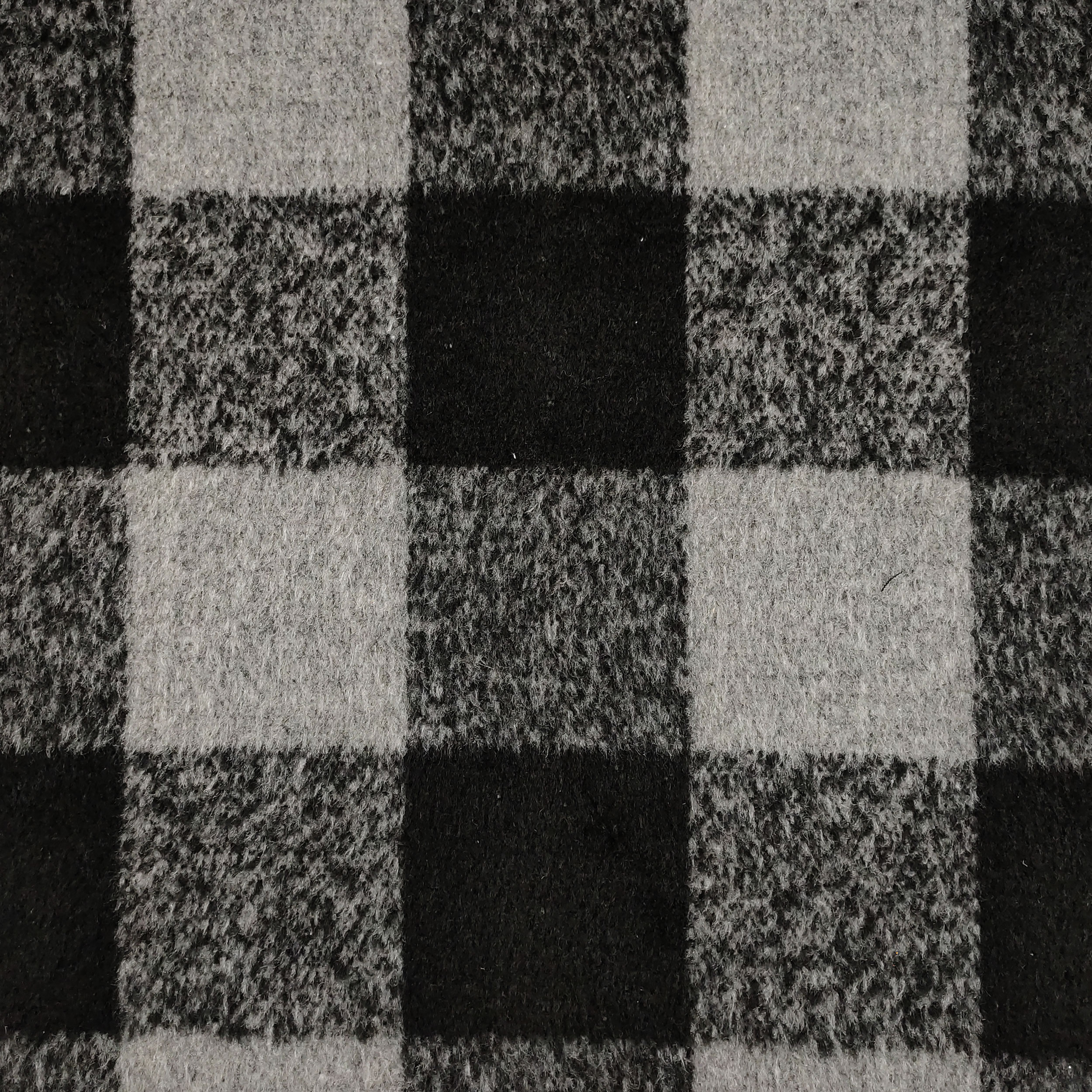 Manteau à carreaux gris et noirs