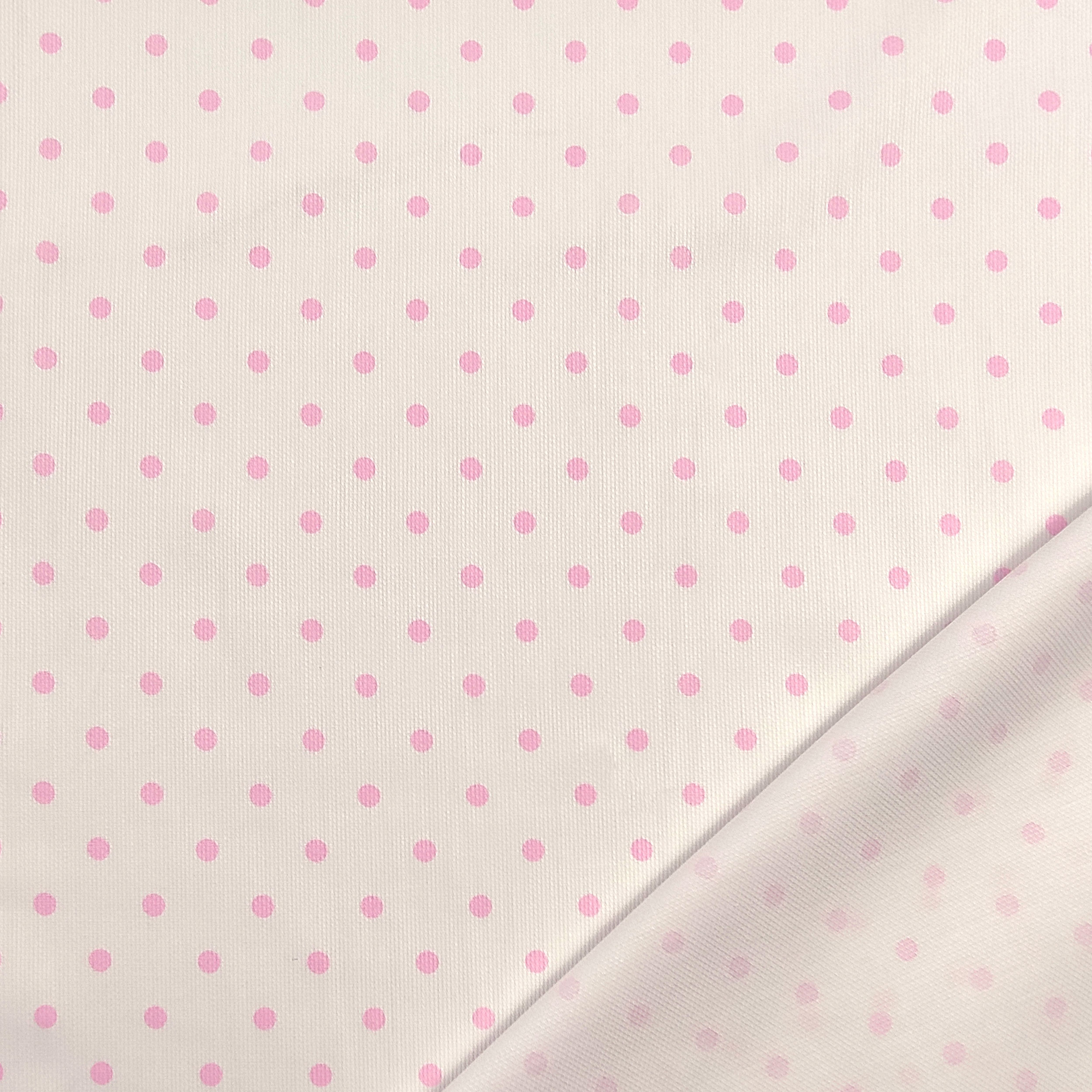 Baumwoll-Piquet-Stoff mit rosa Tupfen