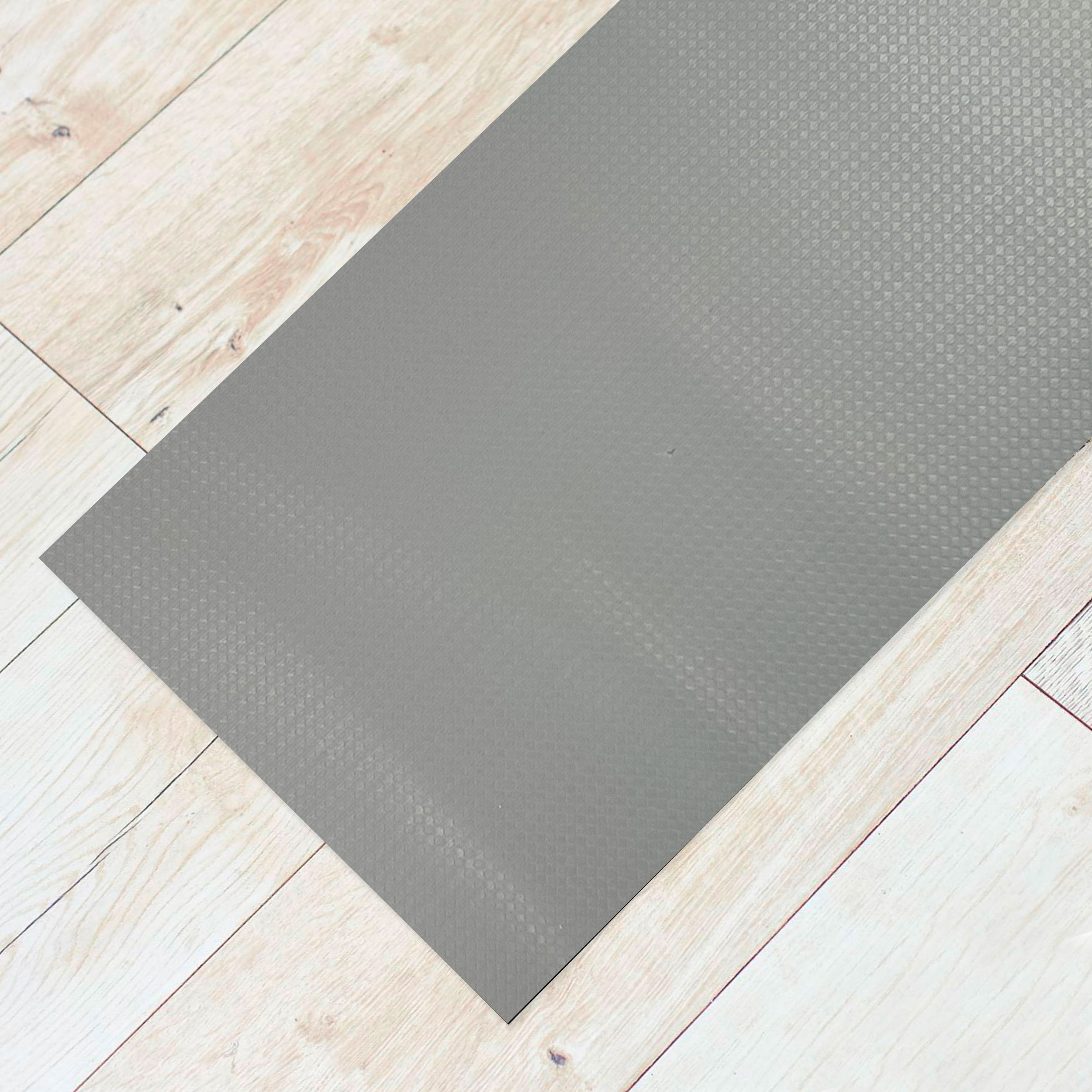 Tapis gris tressé antidérapant Image