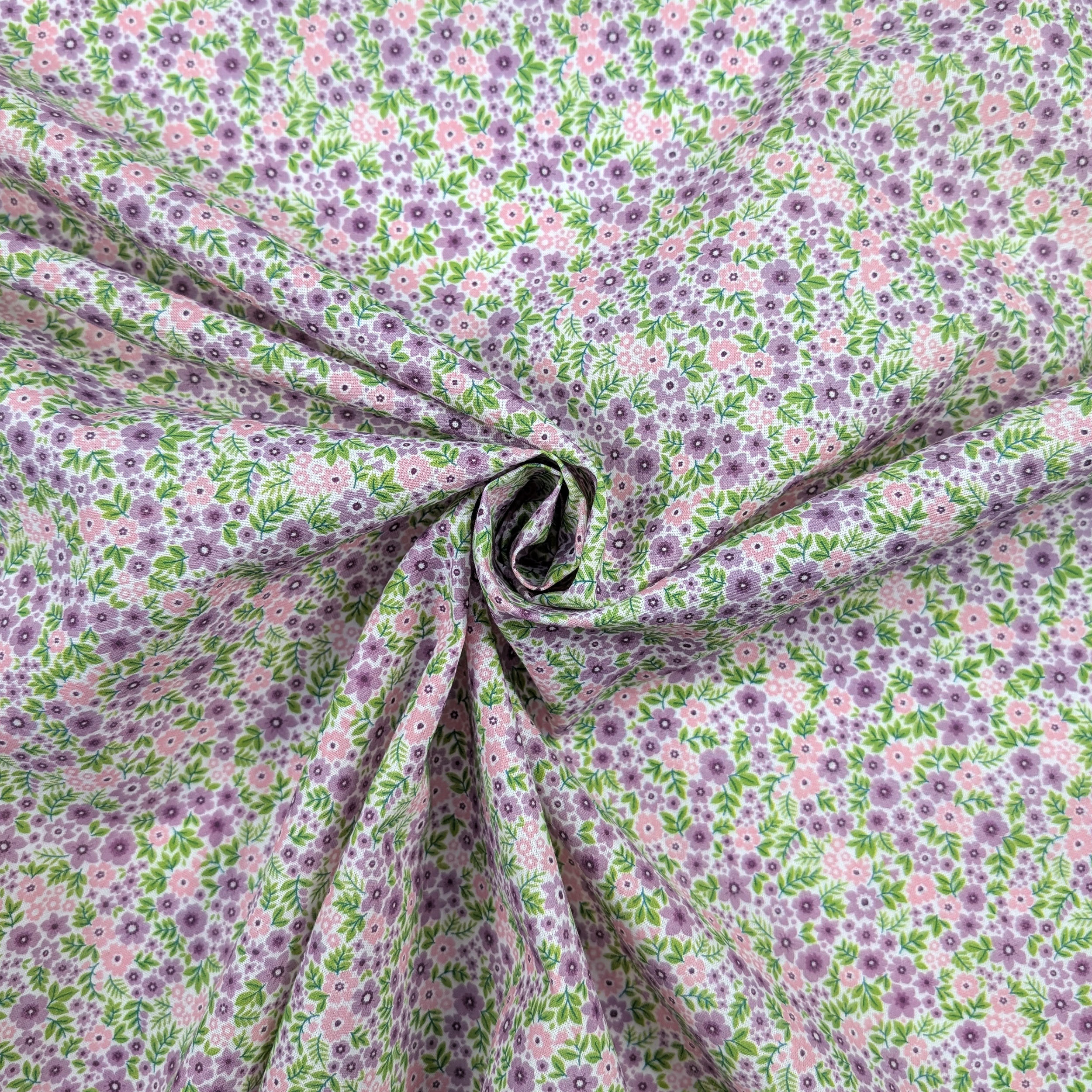 Percale cotton with pink and lilac flowers Image