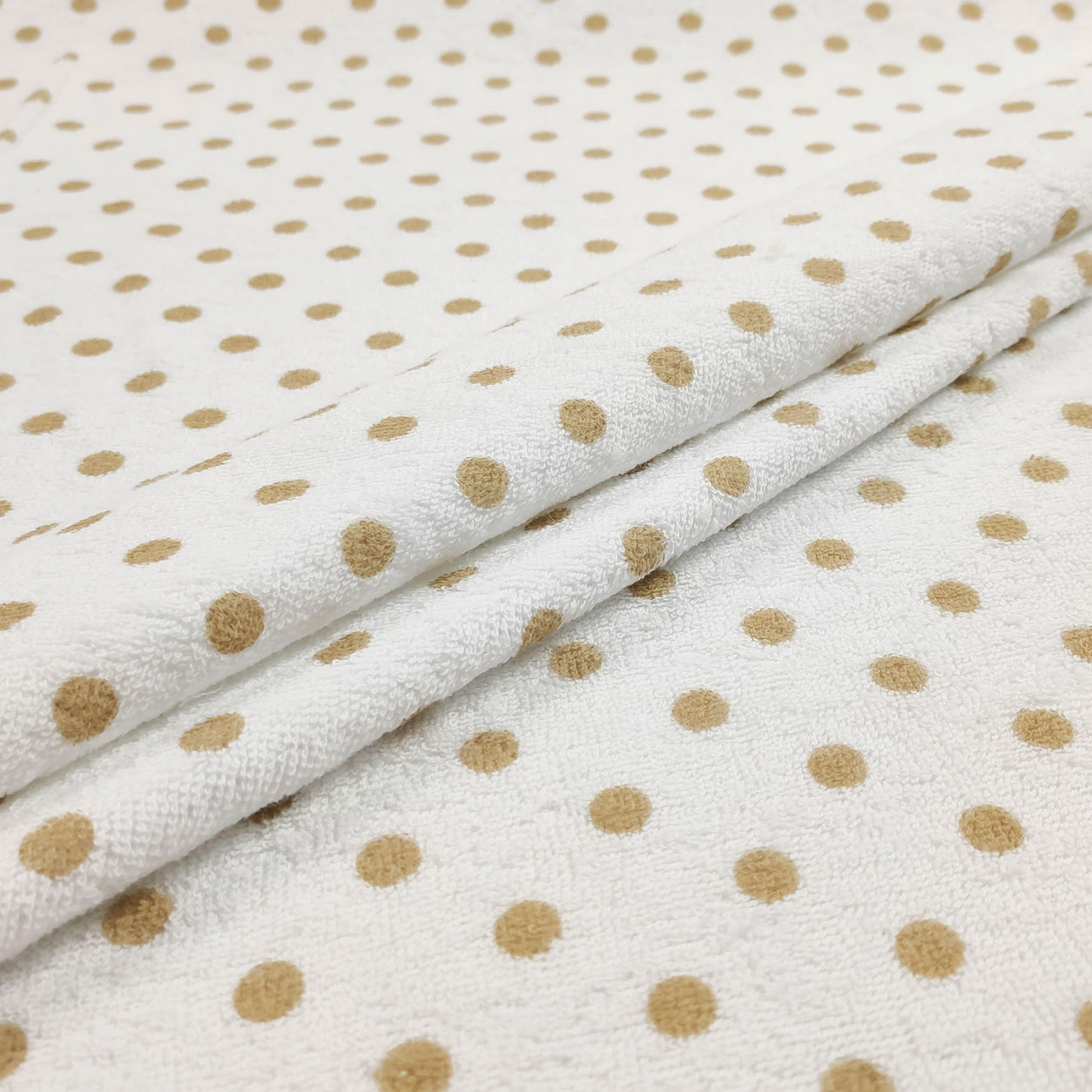 Tela esponjosa estampada de lunares Beige