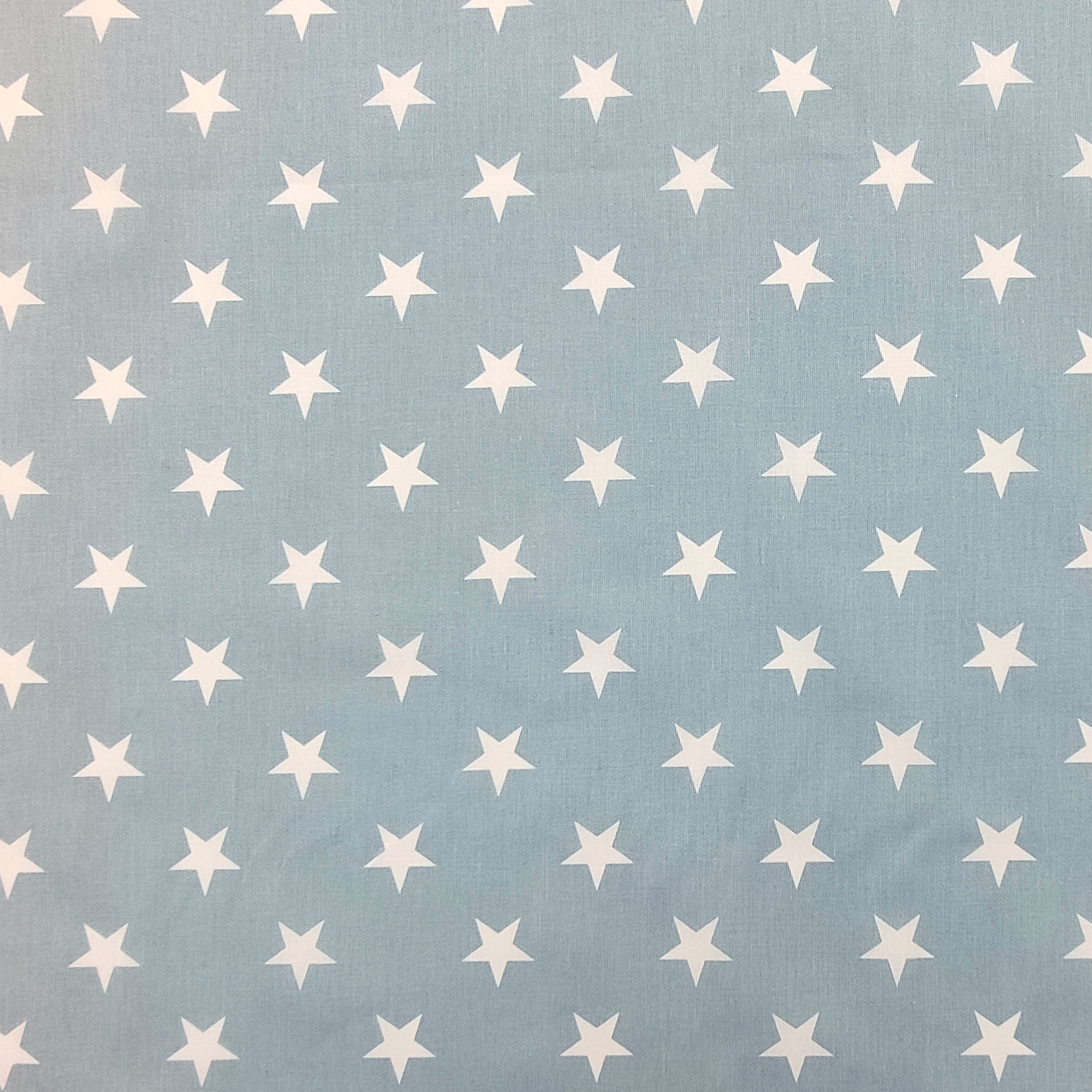 Estrellas blancas de algodón con fondo azul