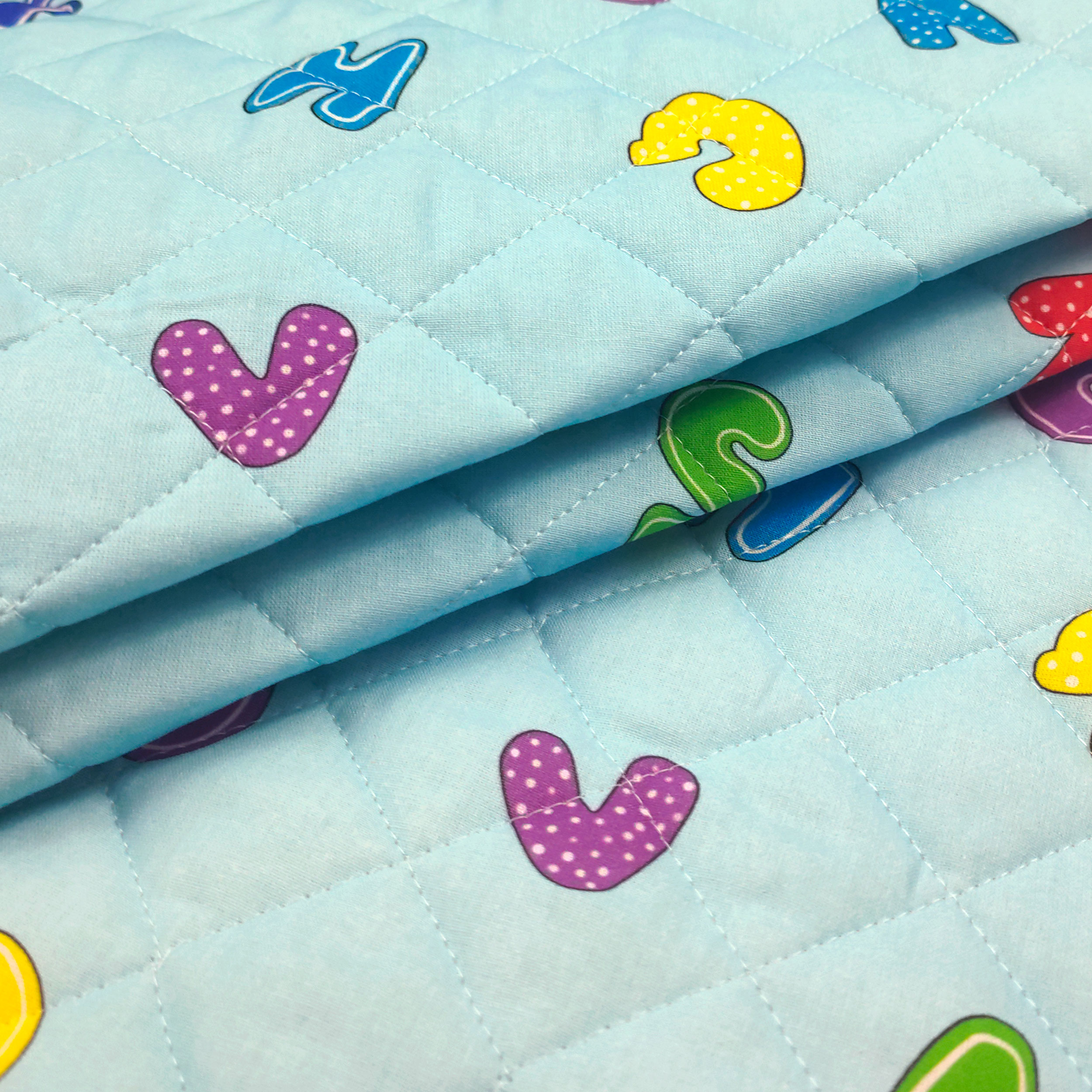 Alphabet Quilted Fabric Light Blue Background Image
