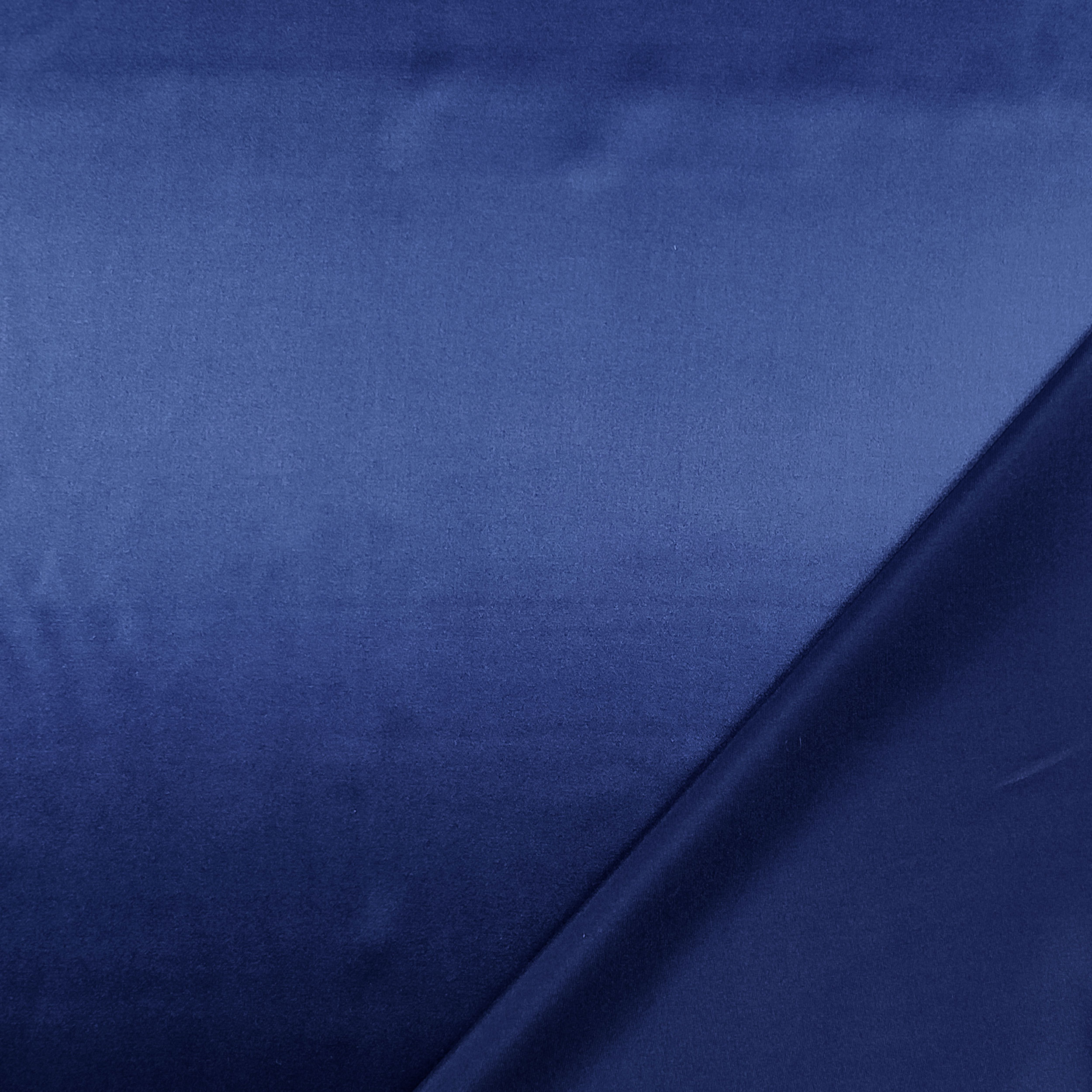 Tissu extensible en satin de soie bleu Image