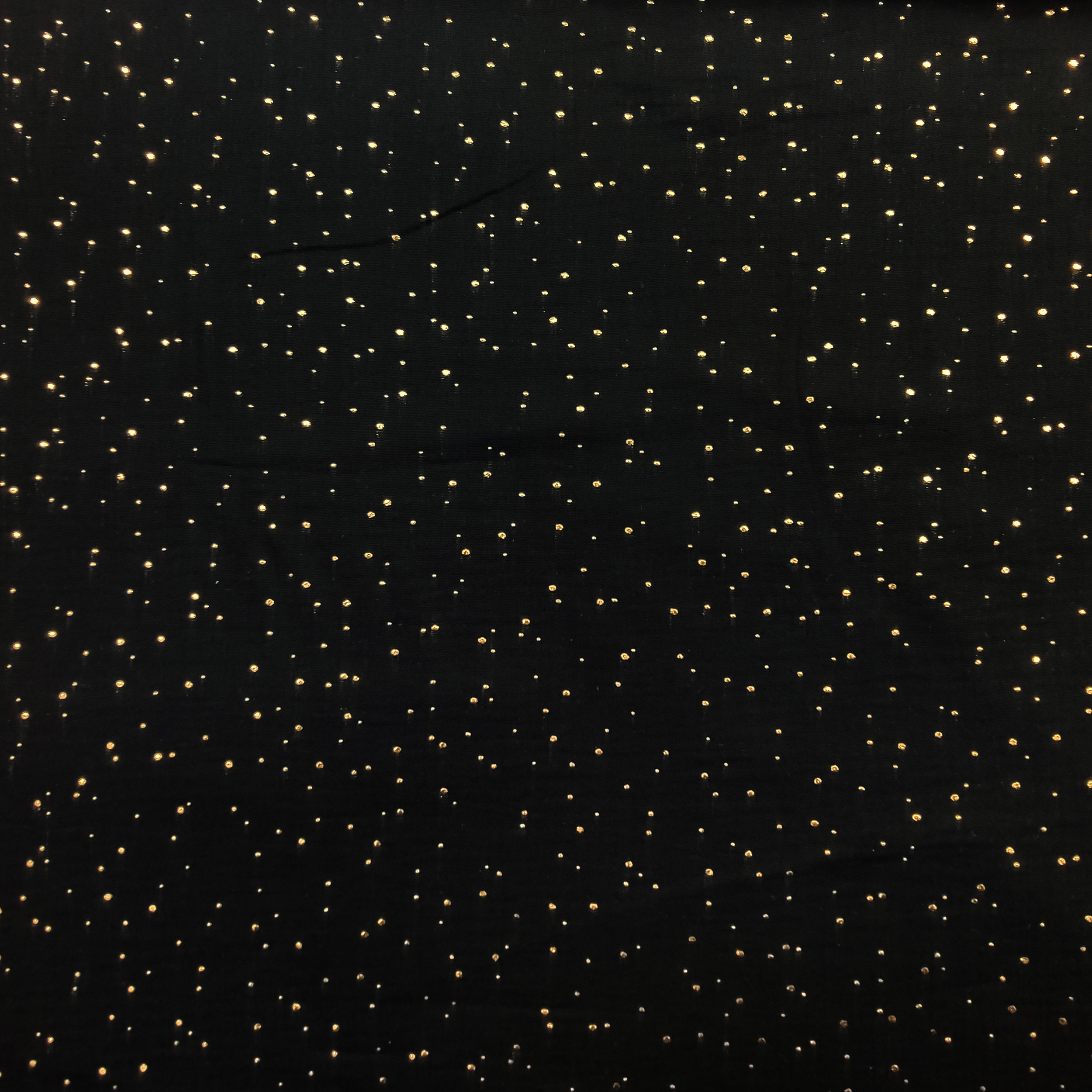 Schwarzer Baumwollmusselin mit goldenen Polka Dots