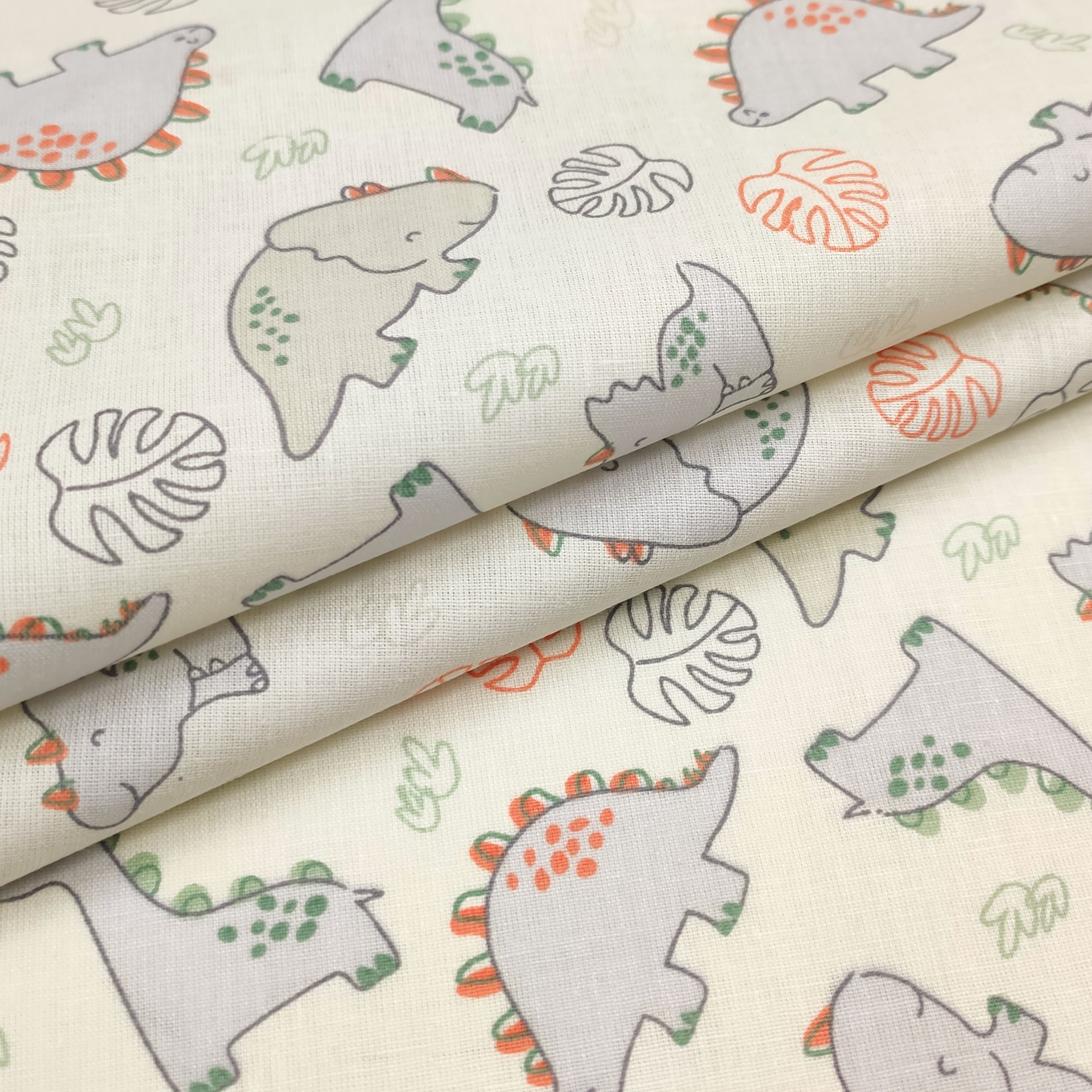Tissu de coton Dinosaures Fond jaune