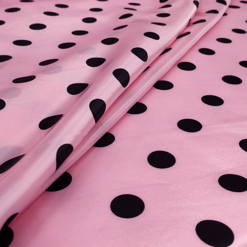 Tissu de satin Carnaval Noir à pois Fond rose Image