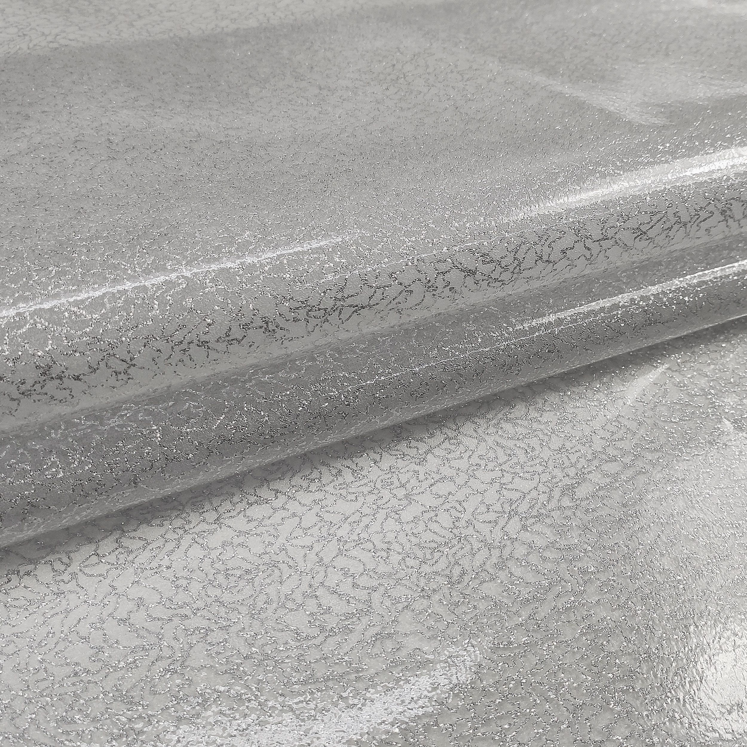 Nappes plastifiées à motifs pailletés argentés