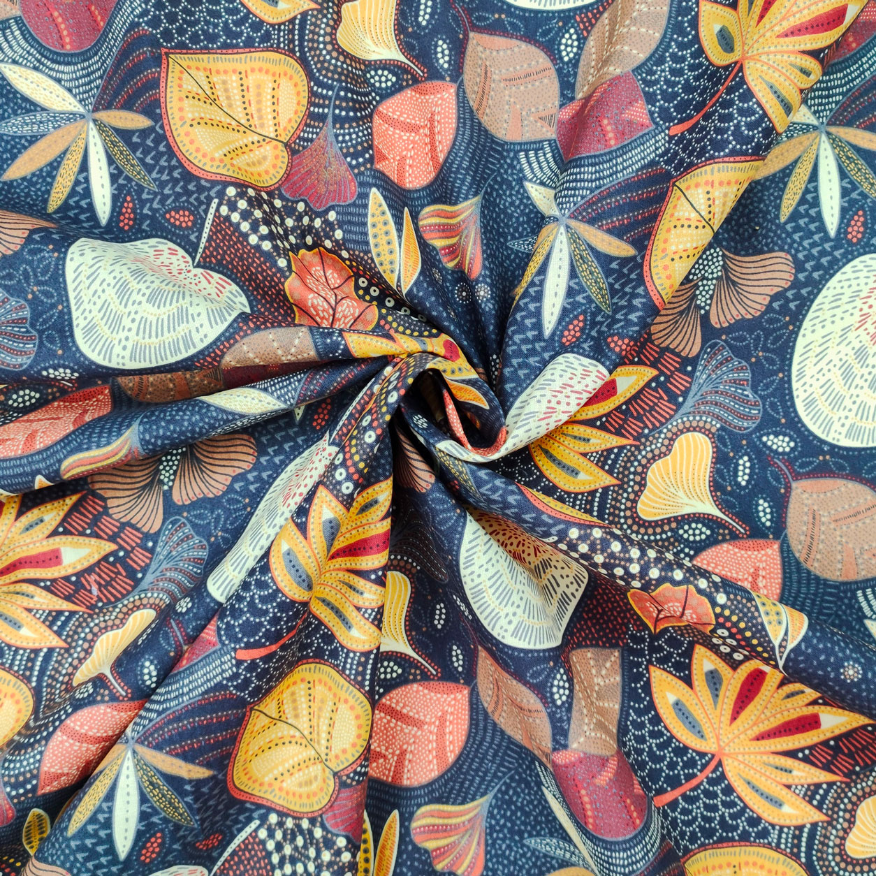 tessuto-in-cotone-foglie-puntinate-marrone-blu
