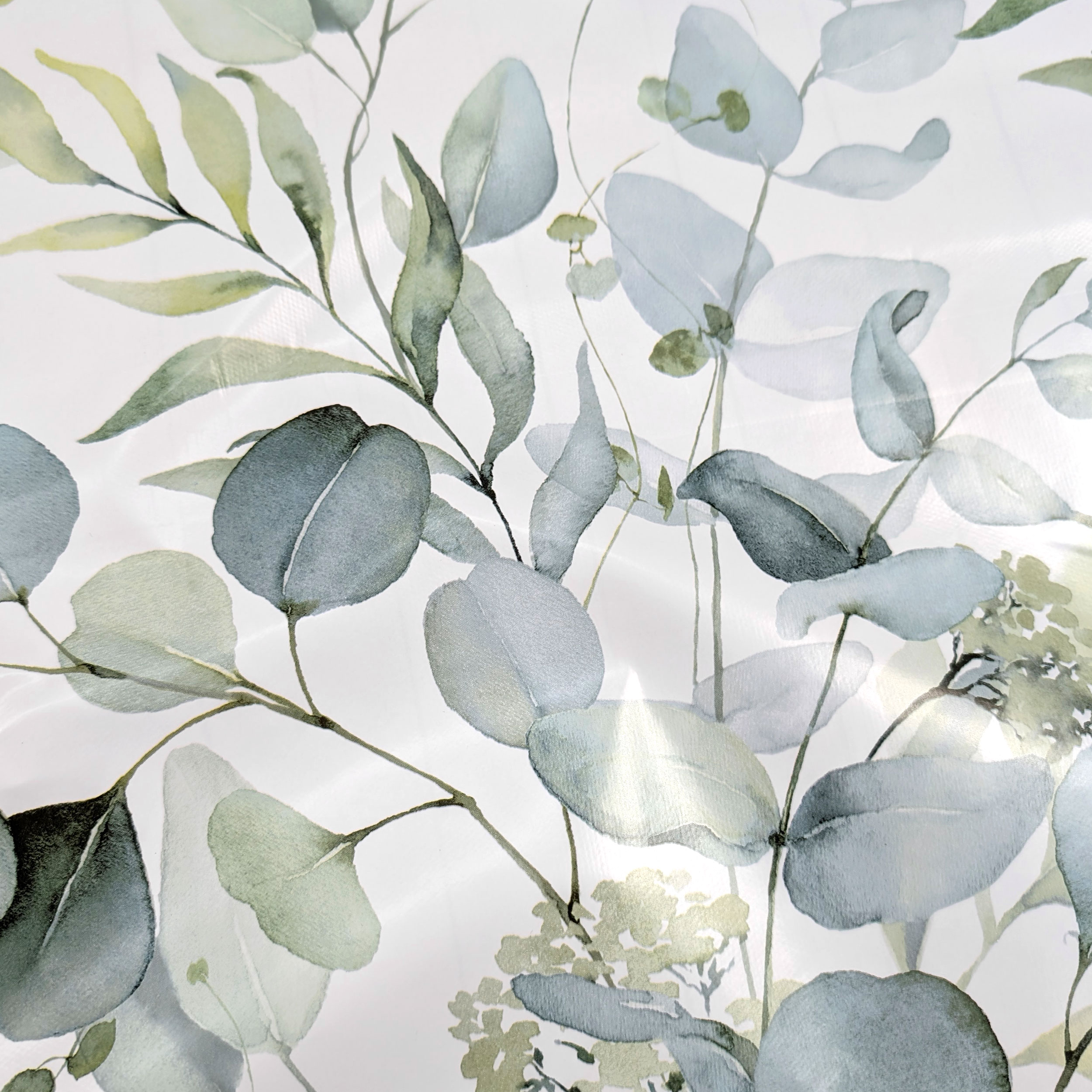 Fabric for Plasticised Tablecloth Green Branches and Leaves Image
