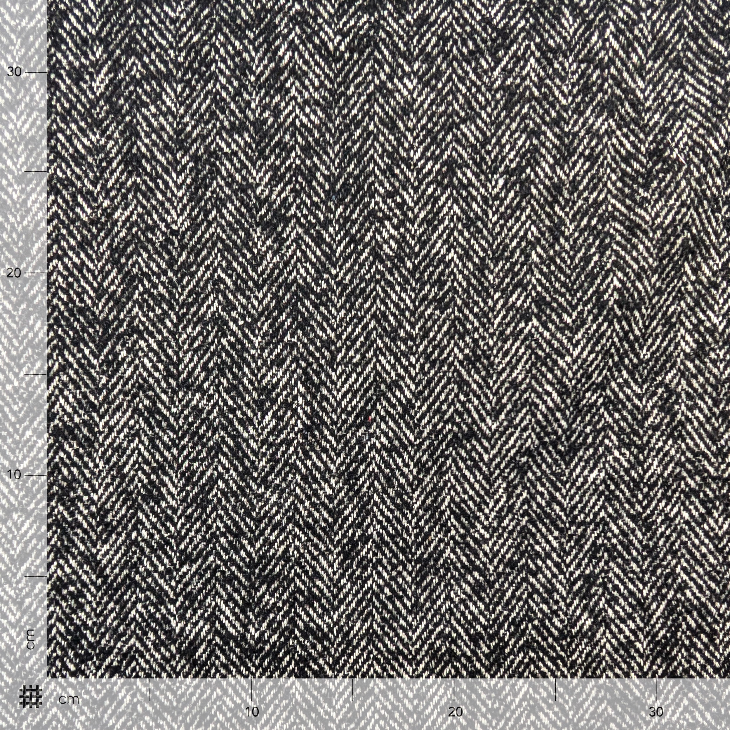 Herringbone Patterned Coat Fabric Image