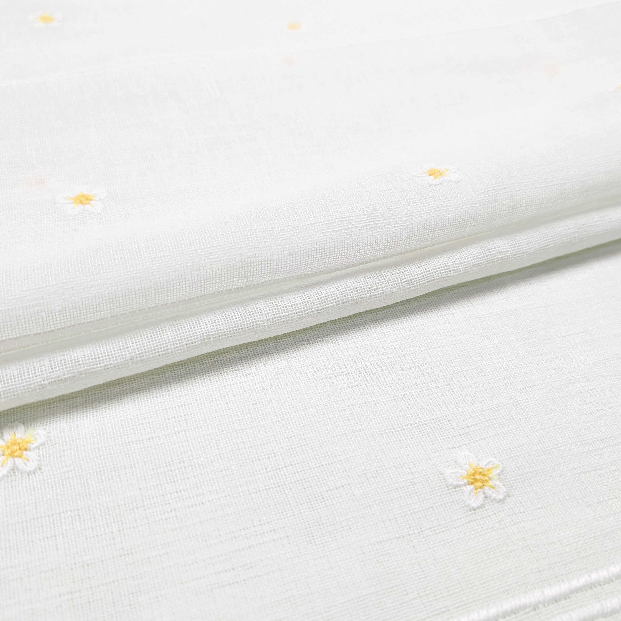 Modular Curtain Fabric with Embroidered Daisies Image