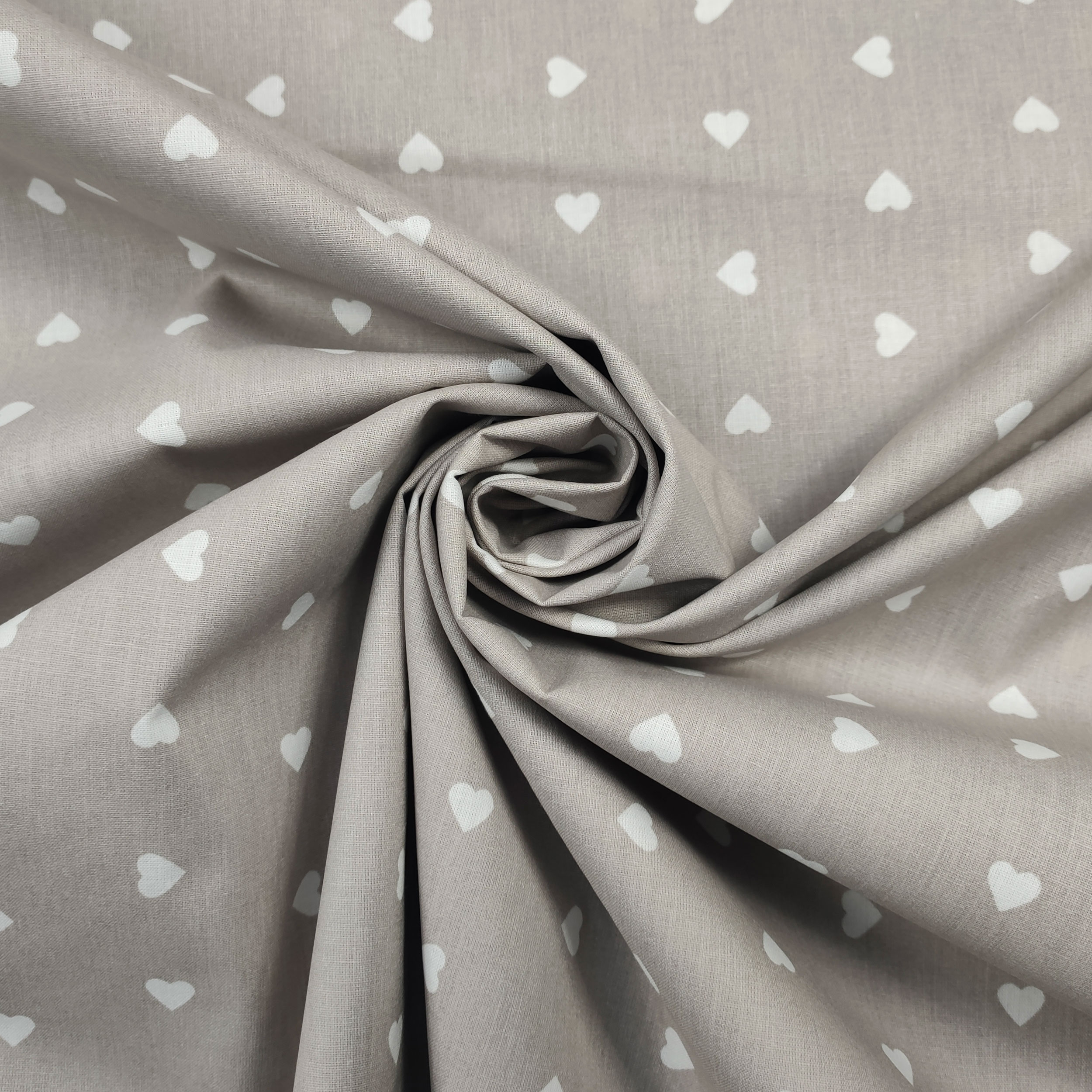 Printed Cotton with White Hearts - Colored Background  Image