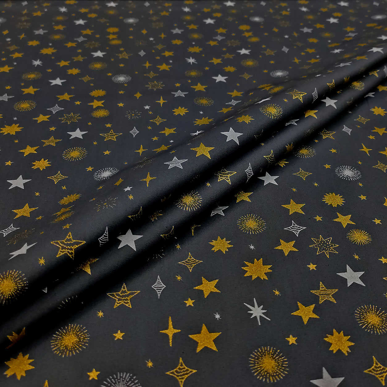 Tela de algodón Estrellas Oro Fondo Blanco Gris