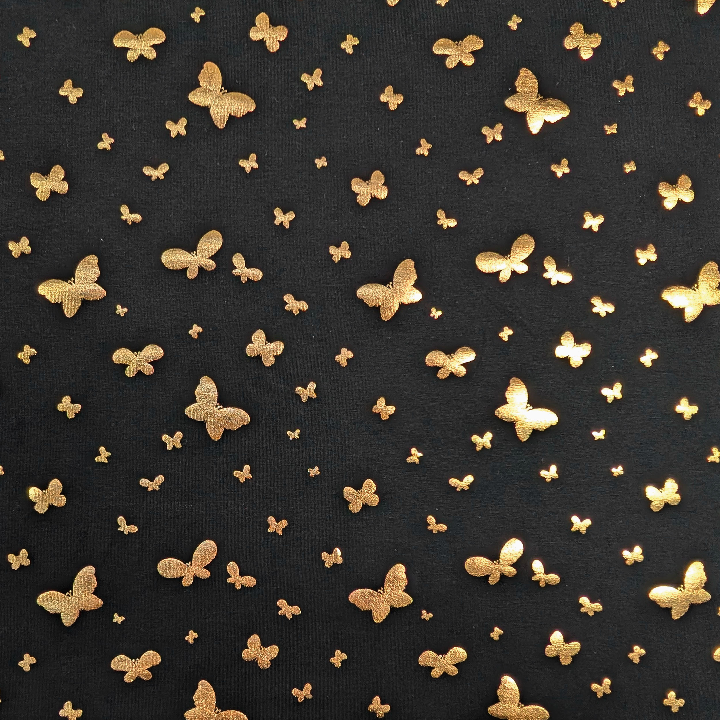 Black cotton jersey with gold butterflies Image
