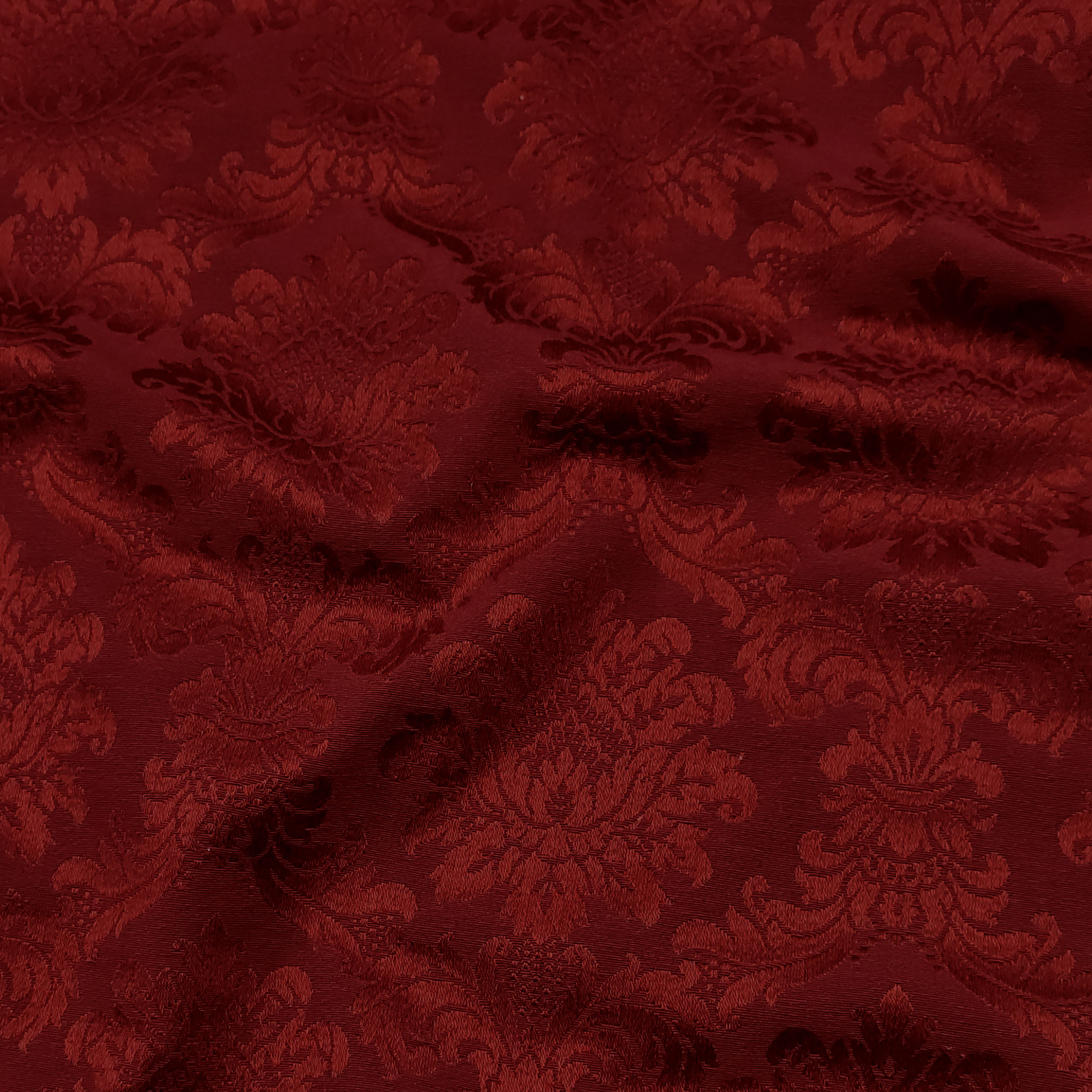 Tissu damassé rouge foncé