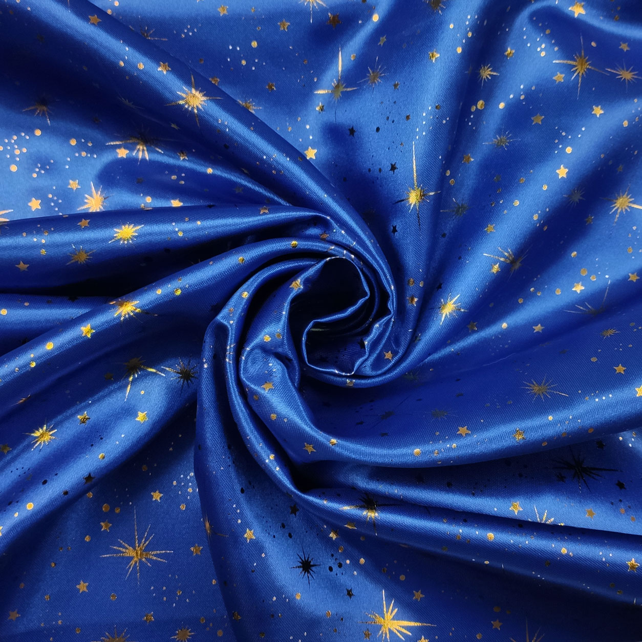 tessuto-raso-stampato-con-stelle-oro