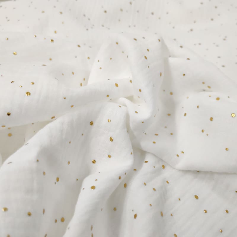 Mussola Cotone Bianco con Pois Oro