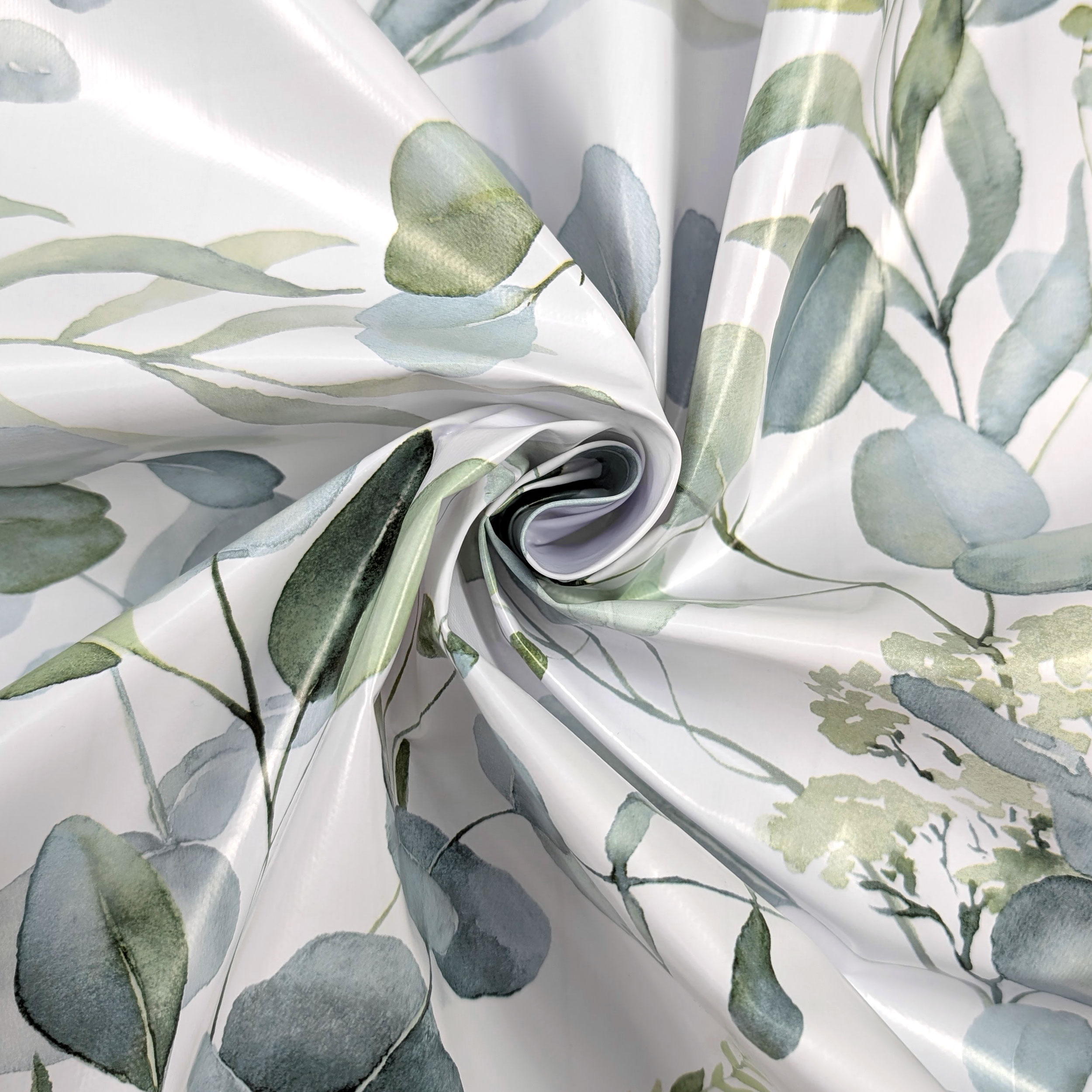 Fabric for Plasticised Tablecloth Green Branches and Leaves Image