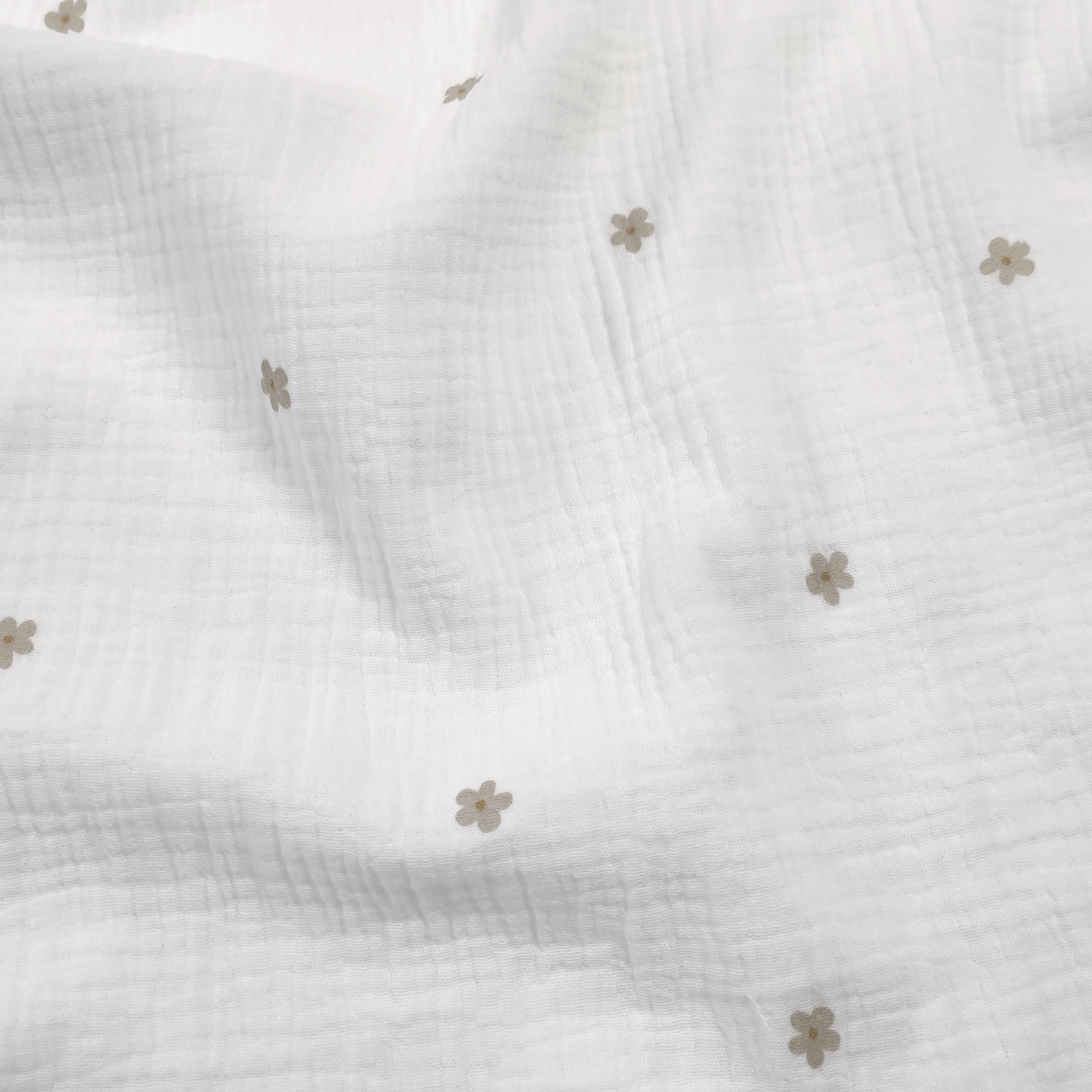 Cotton muslin with little flowers Beige Image