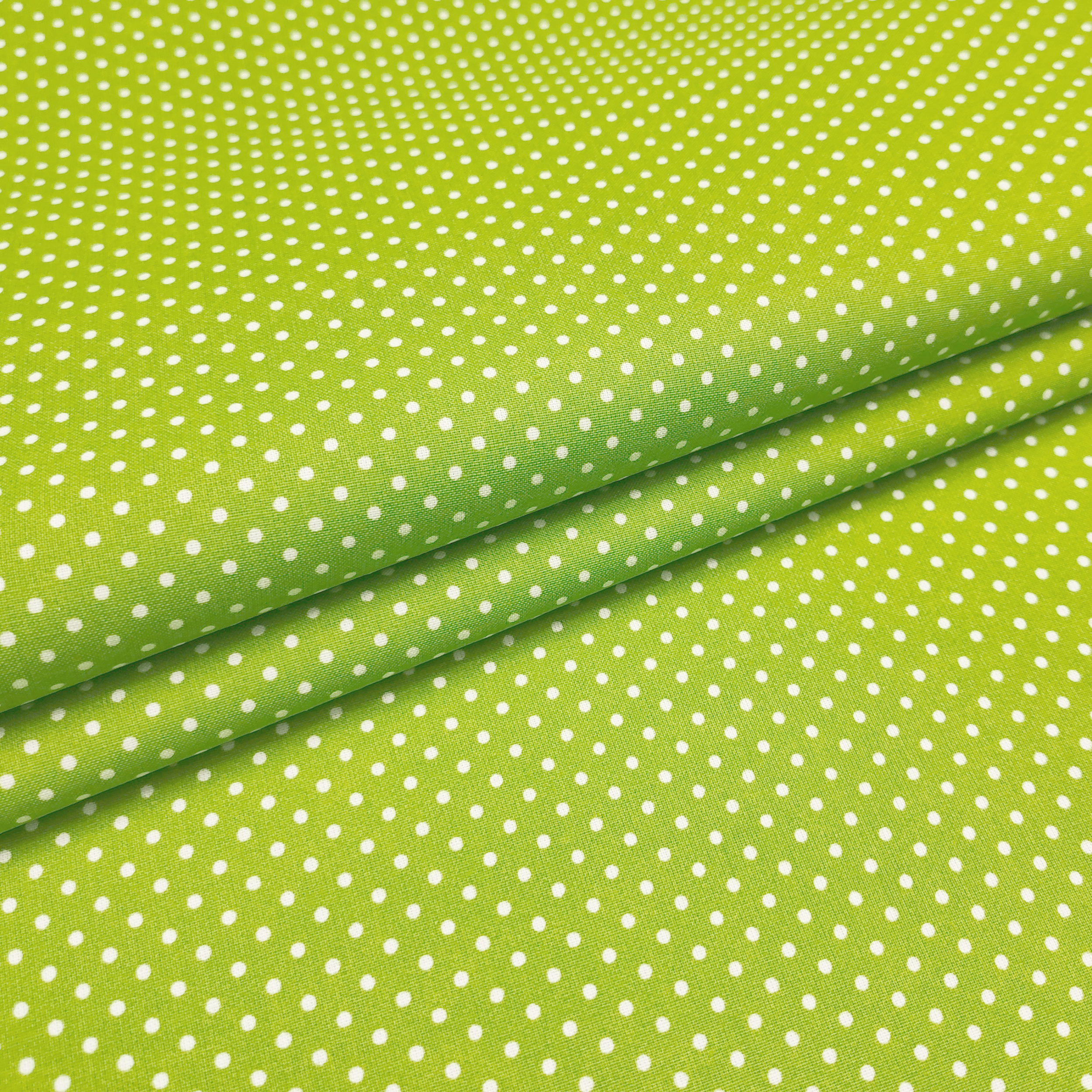 Tissu de coton vert à petits pois Image