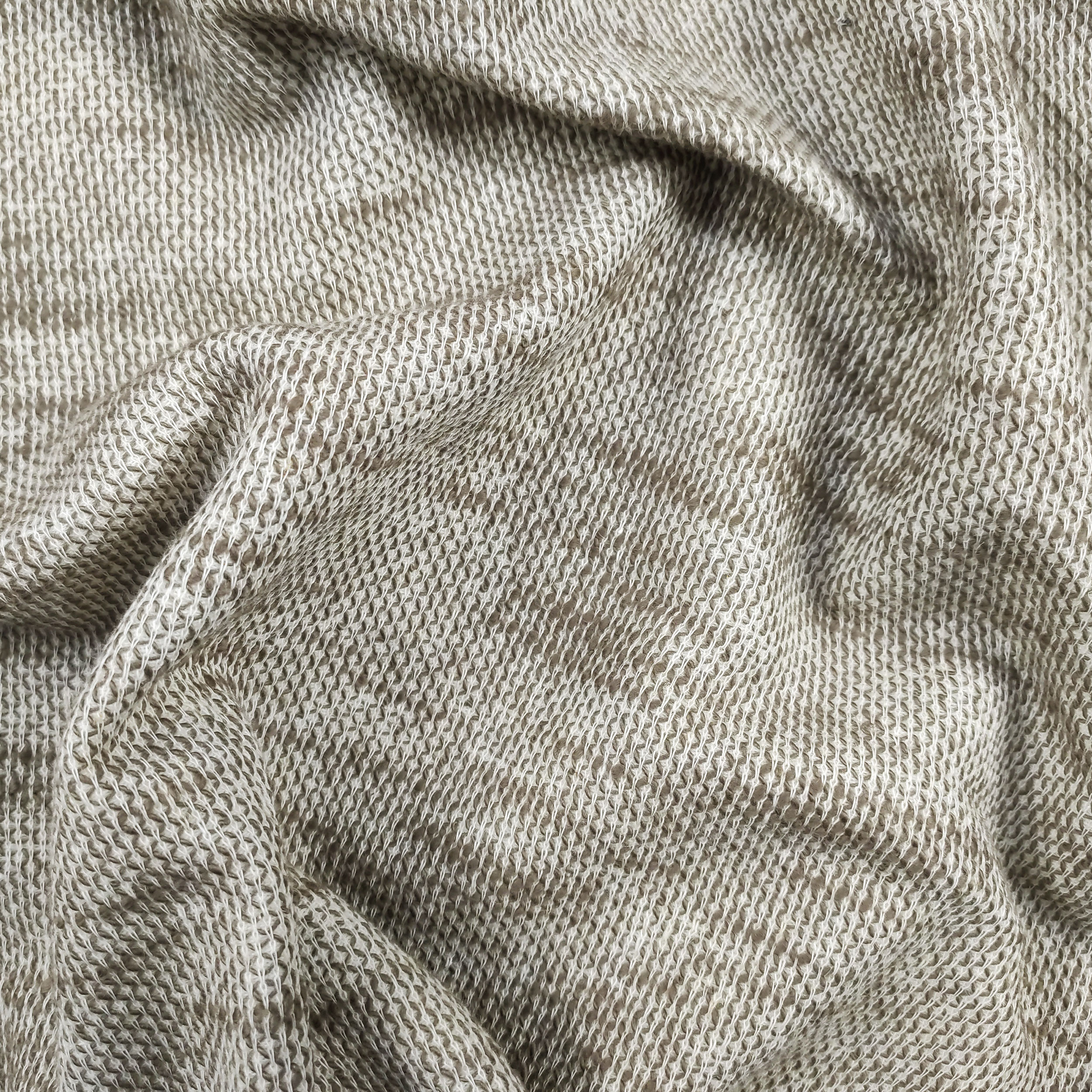 Tissu en maille beige mélangé