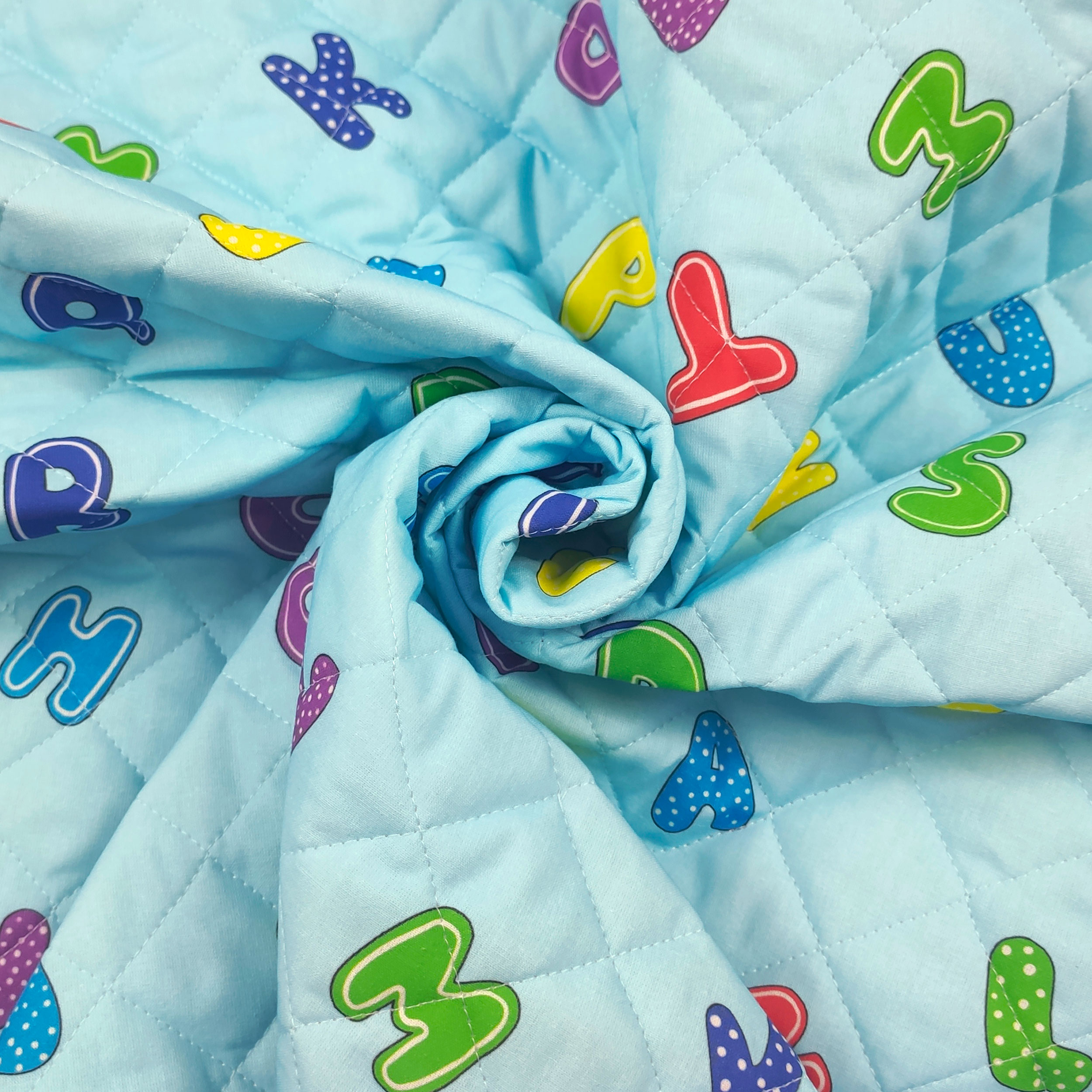 Alphabet Quilted Fabric Light Blue Background Image